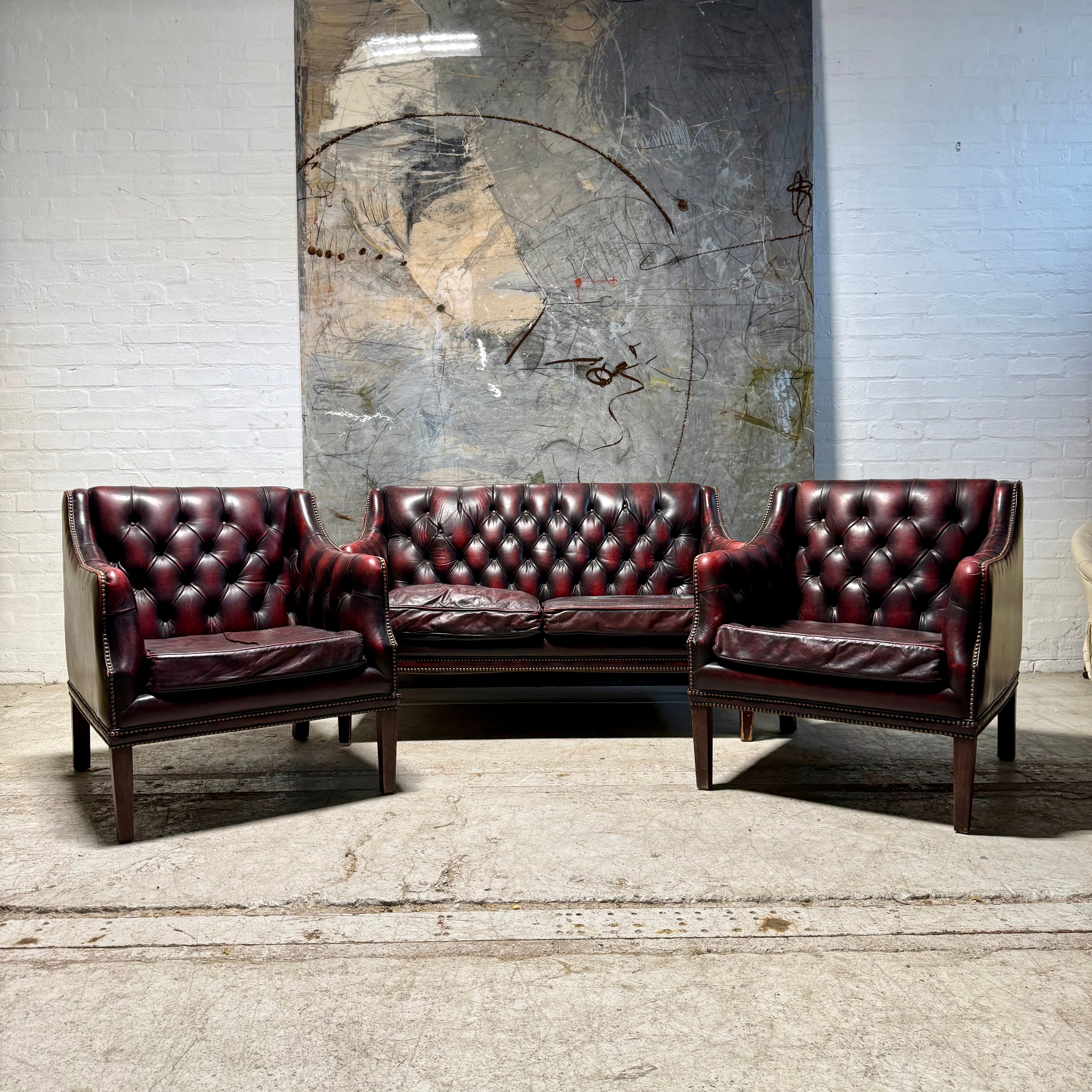 A Great Vintage Chippendale Style Suite in Wine Leathers