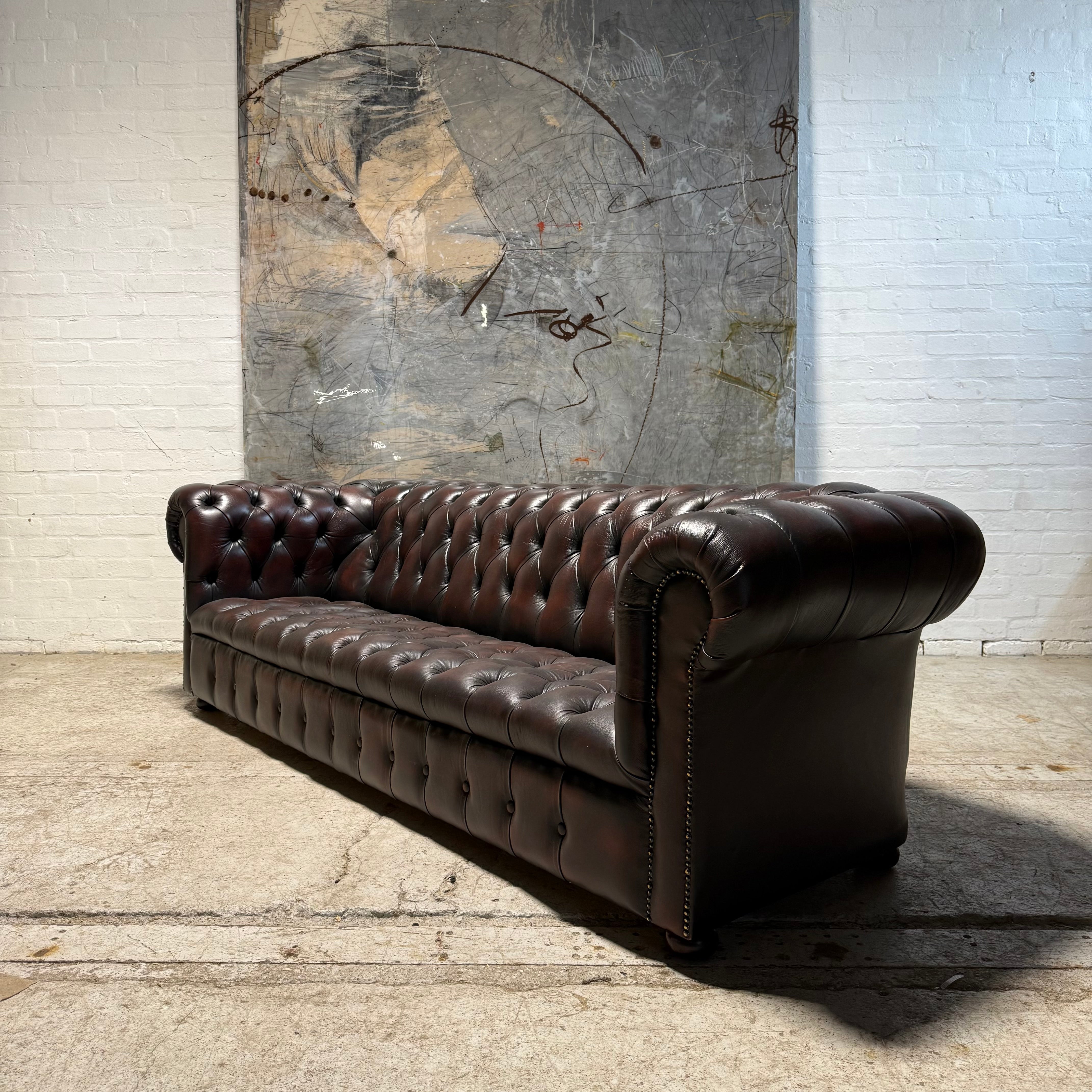 An Exceptional Second Hand Leather Chesterfield Sofa - 4 Seater in Dark Conker Brown