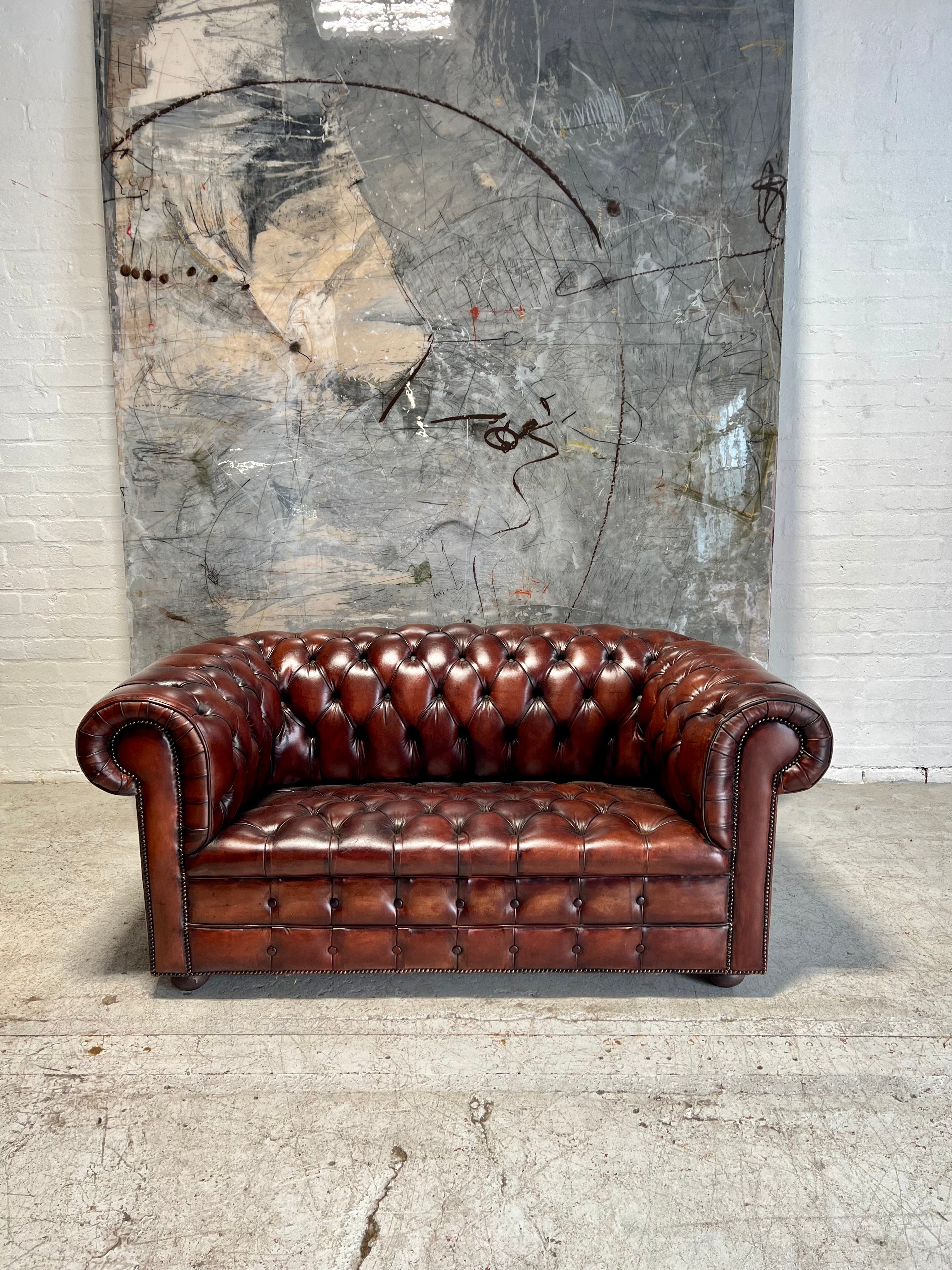 A Rich Chestnut Hand Dyed Vintage Leather Chesterfield Sofa