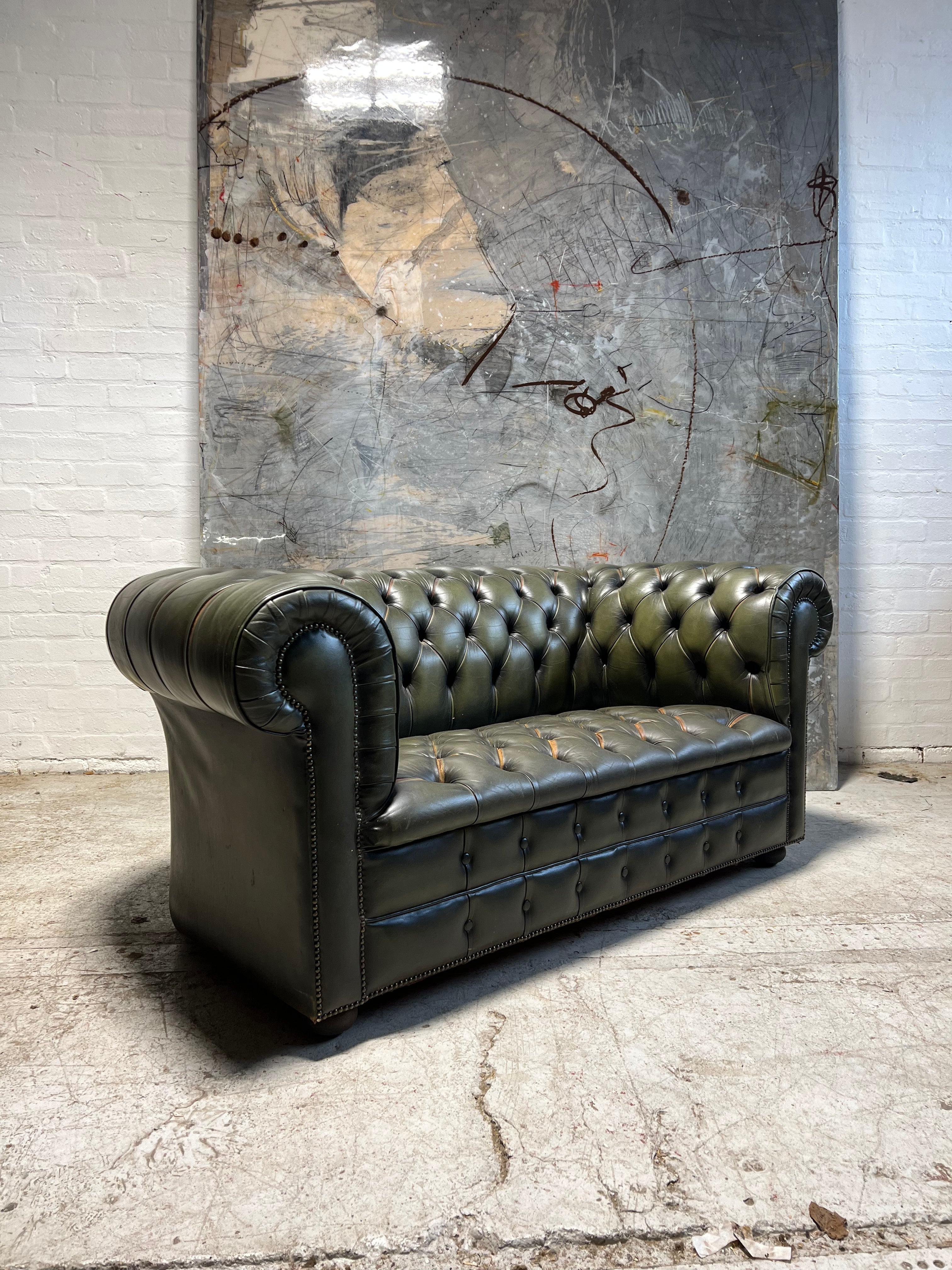 A Very Smart Hand Dyed Leather Chesterfield Sofa