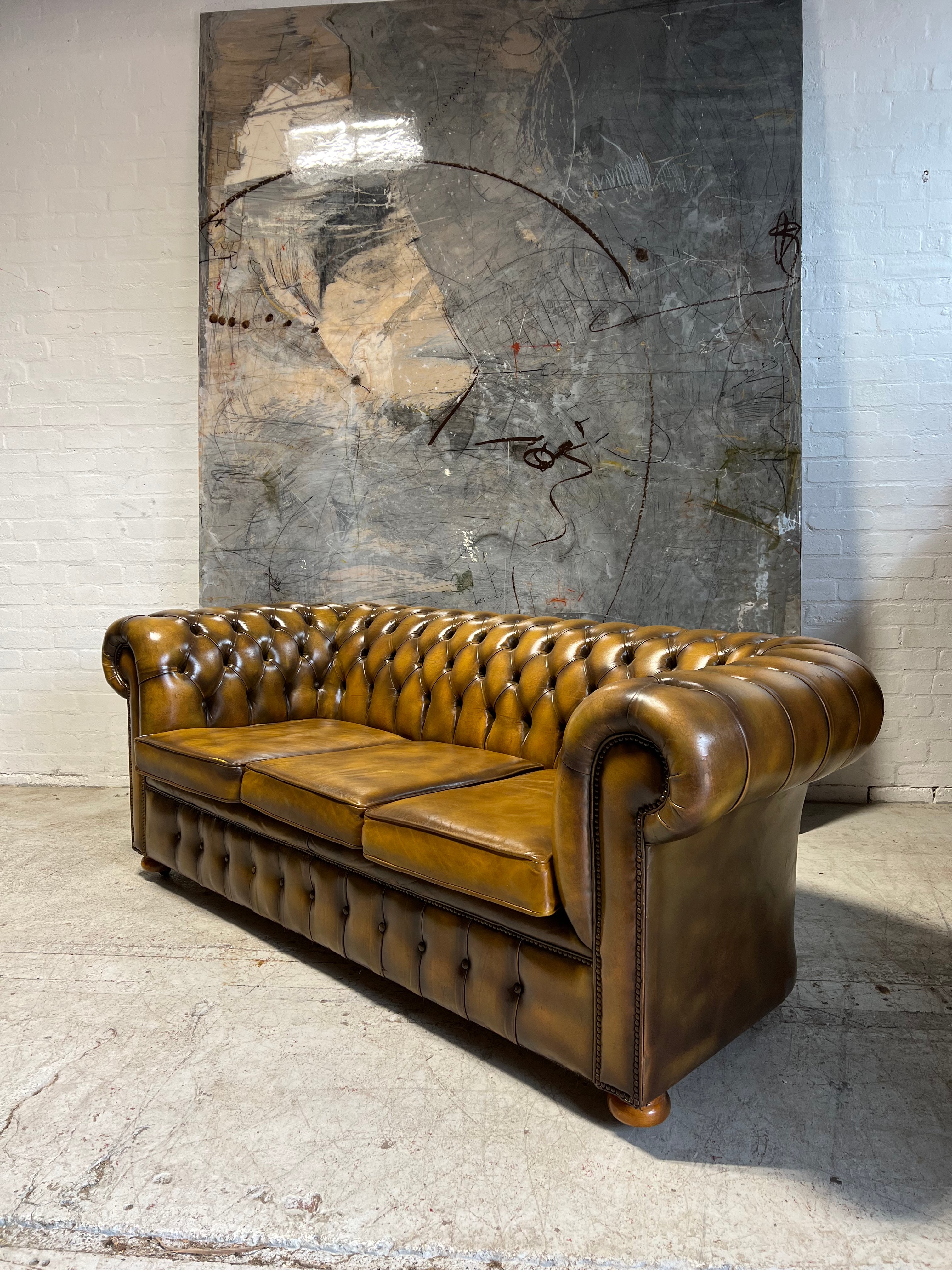 Beautifully Patinated MidC Chesterfield Sofa