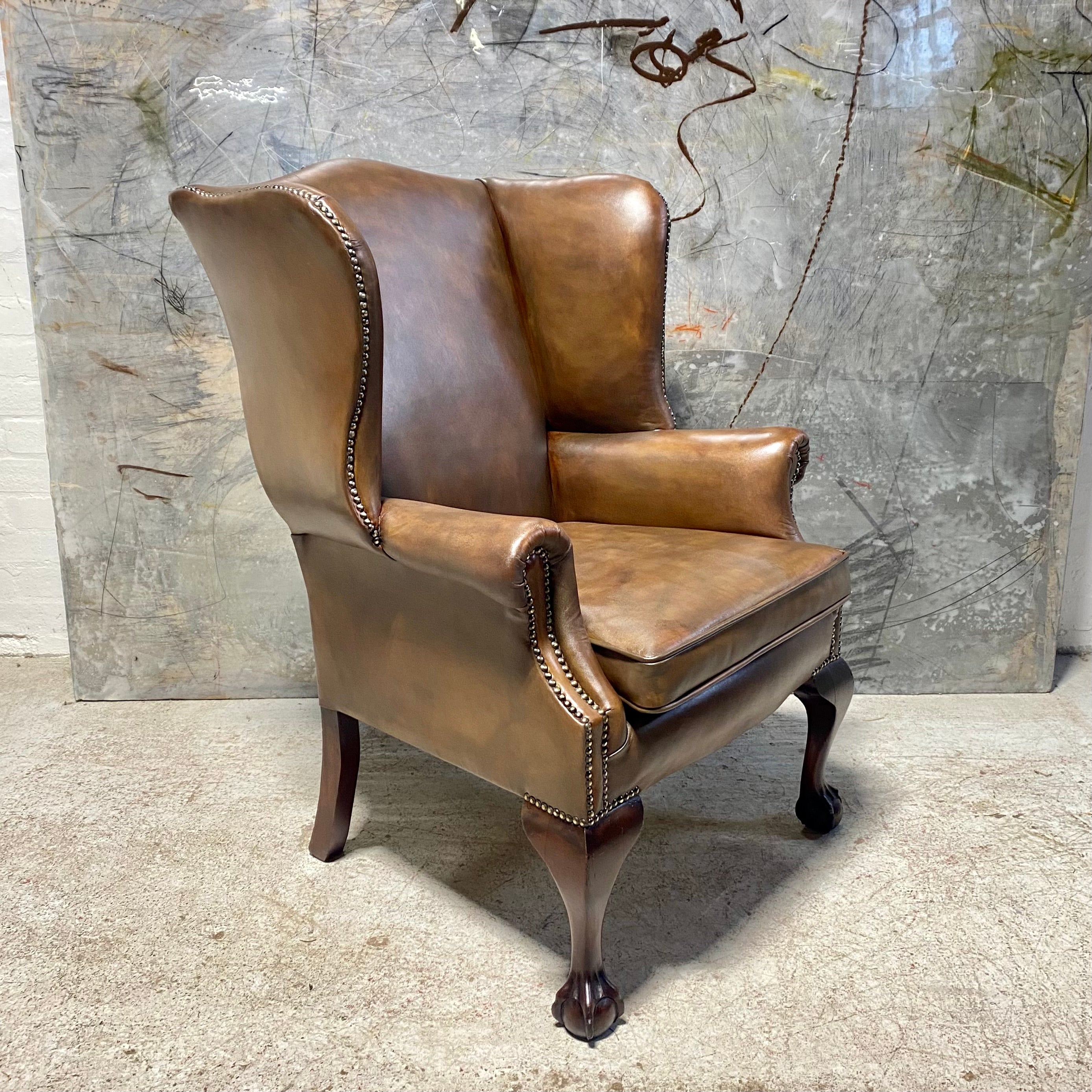 A Beautifully Restored MidC Vintage Gentleman’s Wing Back Chair in Hand Dyed Leather