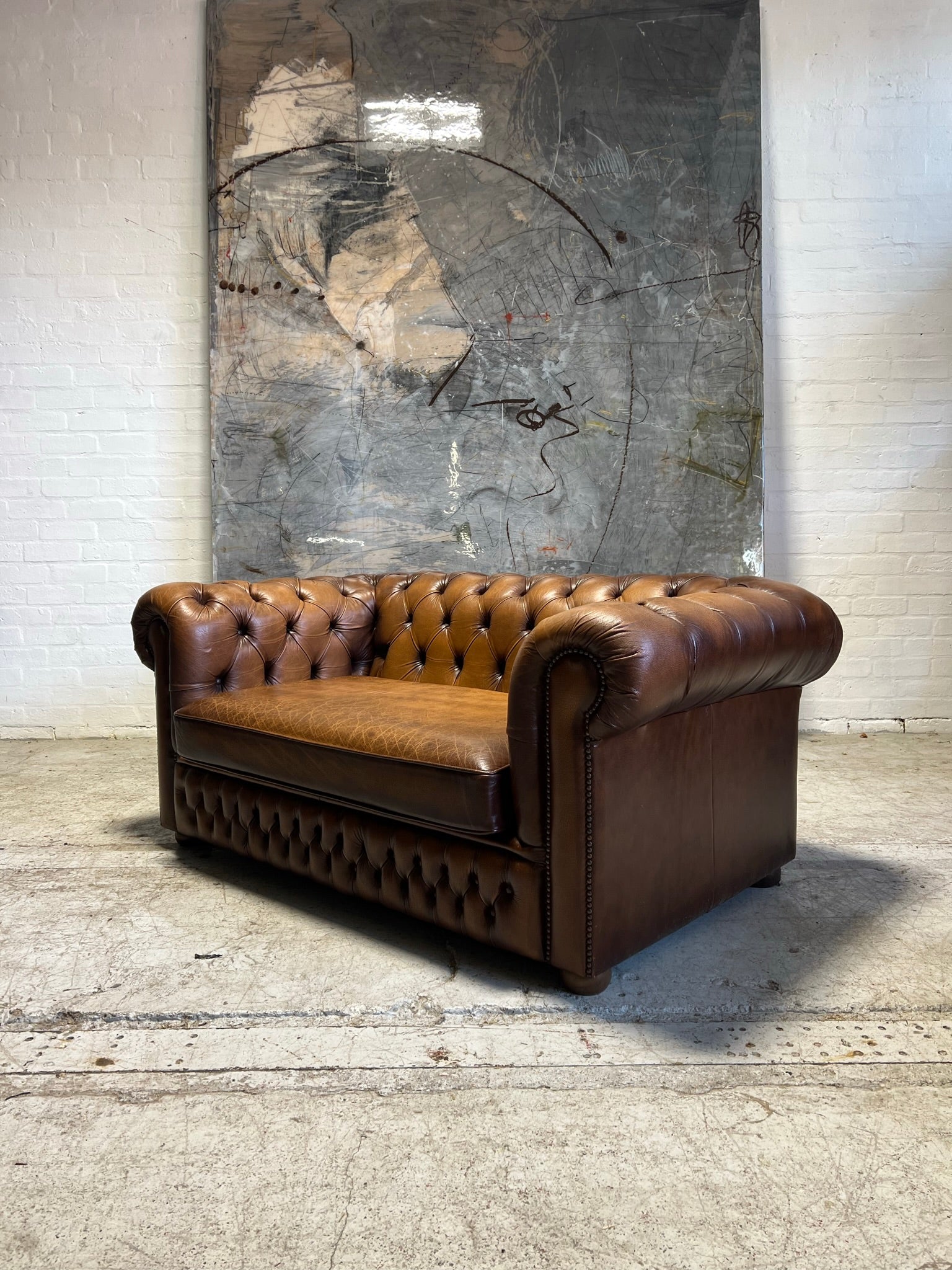 A Lovely Caramel Tan Leather Chesterfield 2 Seater Sofas