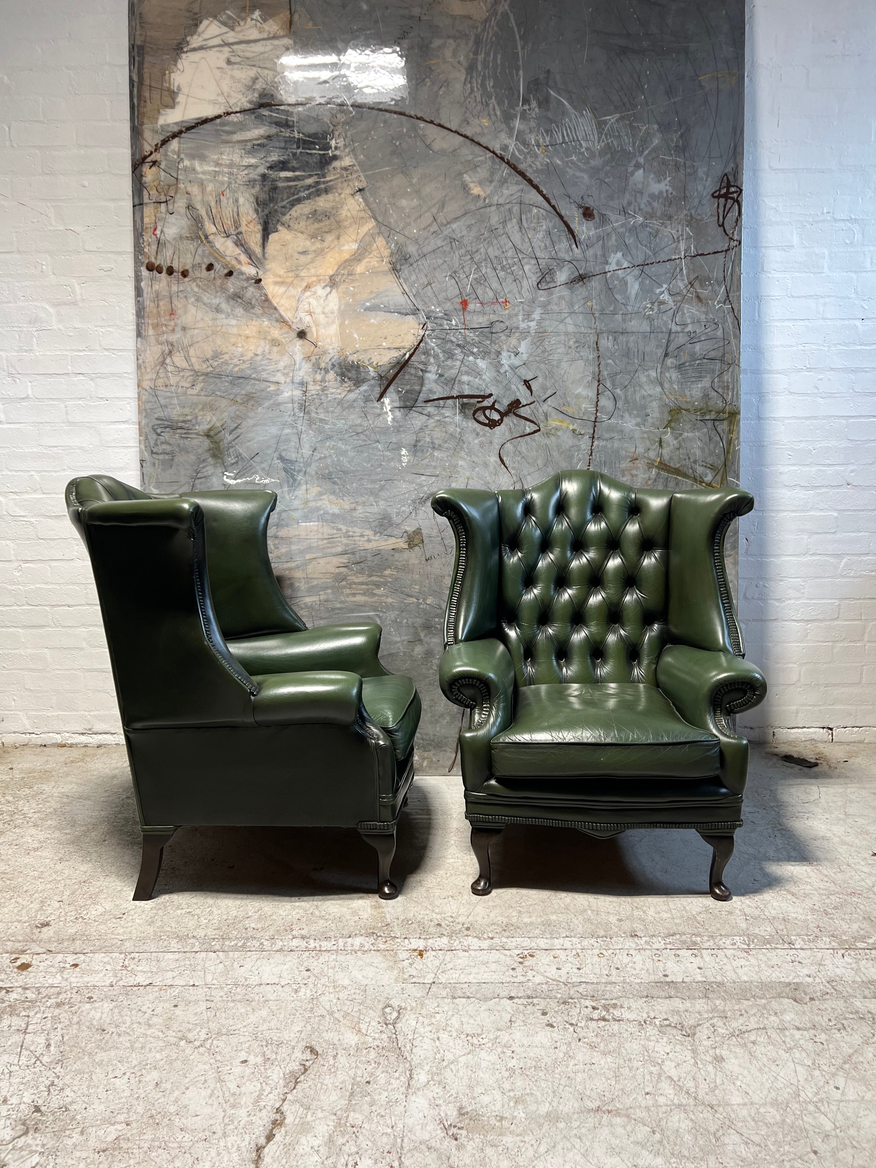 A Very Smart Pair of Racing Green Wing Back Chairs with Ottoman