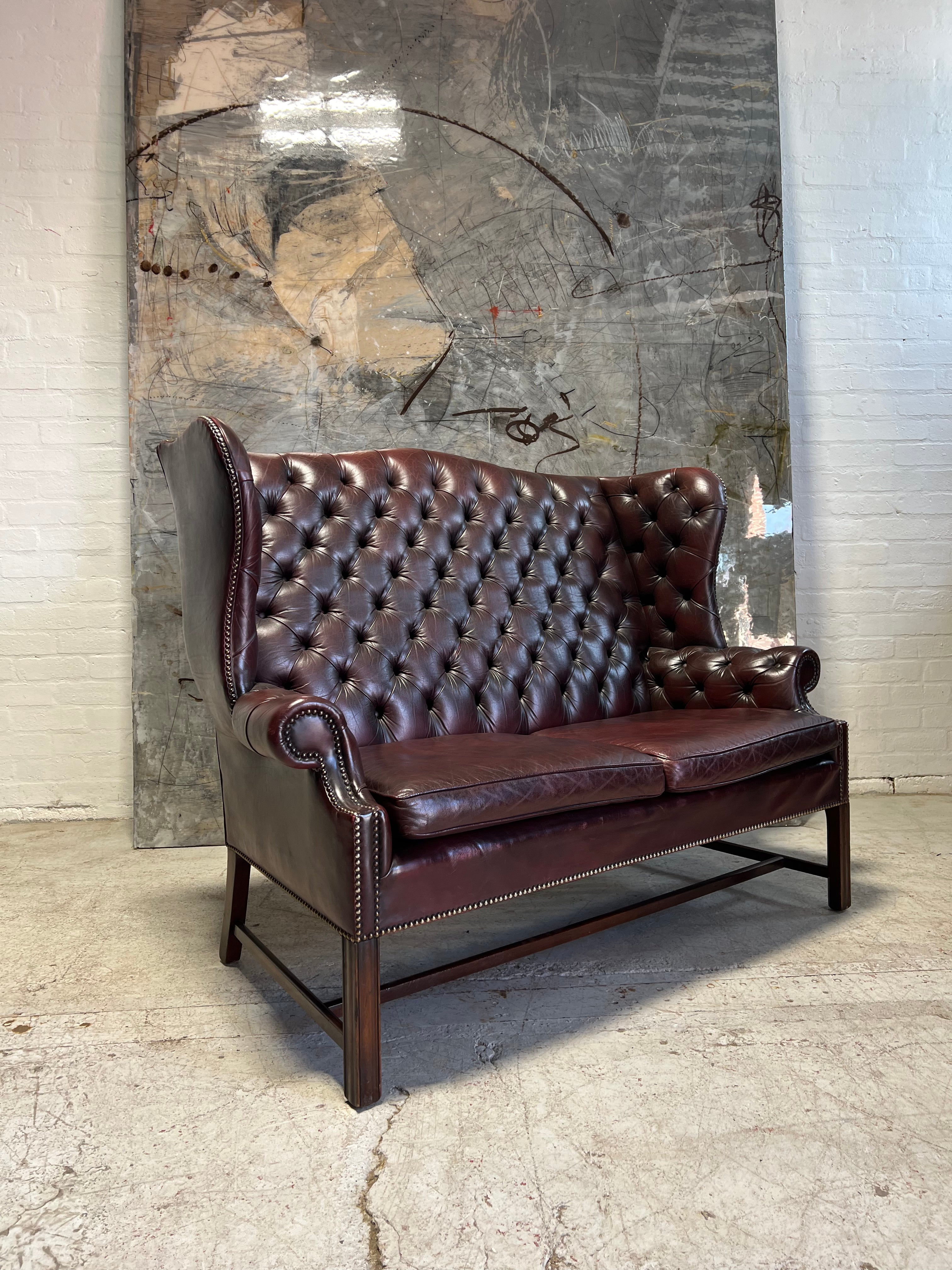 A Very Handsome MidC 2 Seat Wingback Chesterfield Sofa in Hand Dyed Wine Leathers