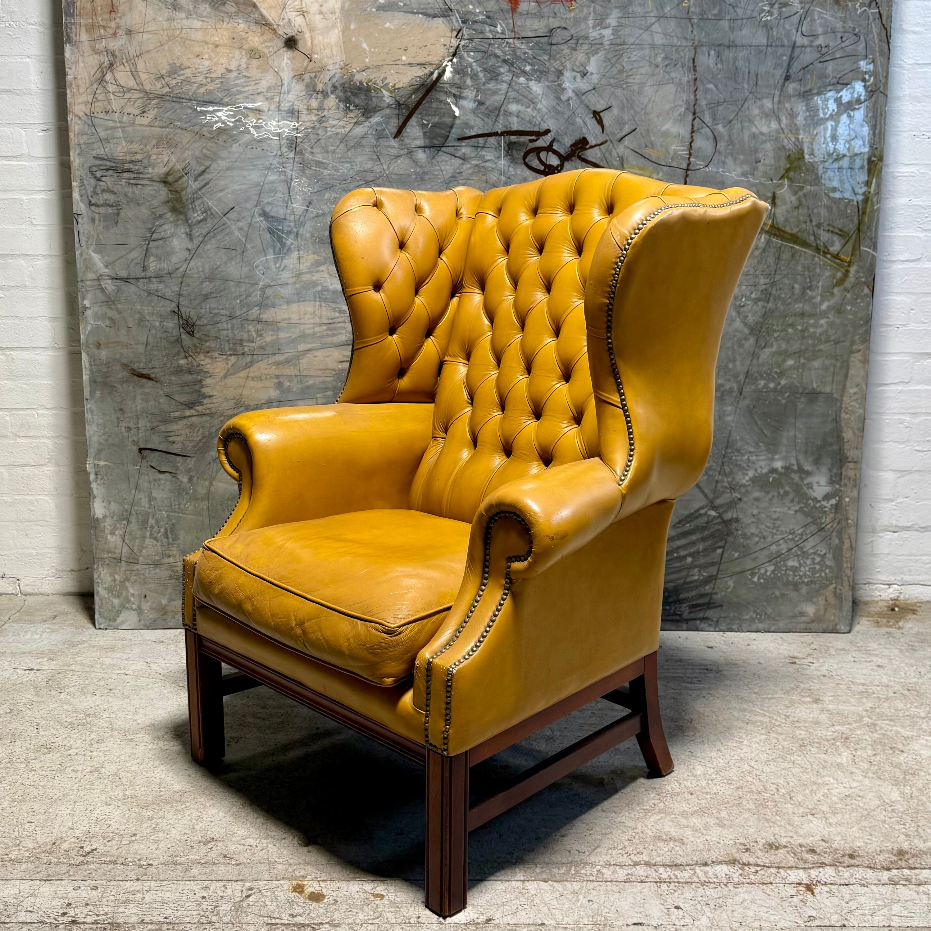 A HUGE Gentleman’s wing back chair at 100cm wide