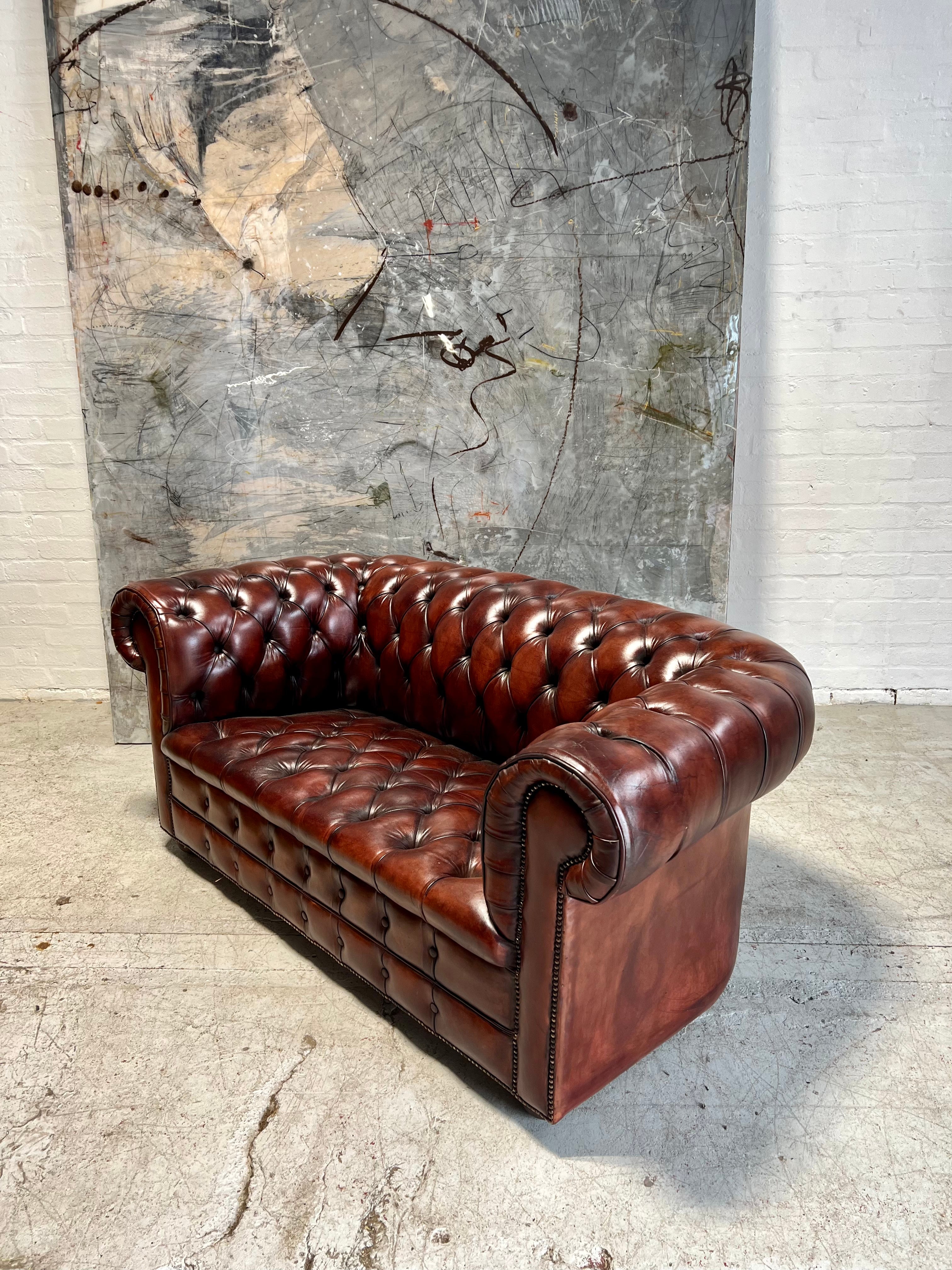 A Rich Chestnut Hand Dyed Vintage Leather Chesterfield Sofa