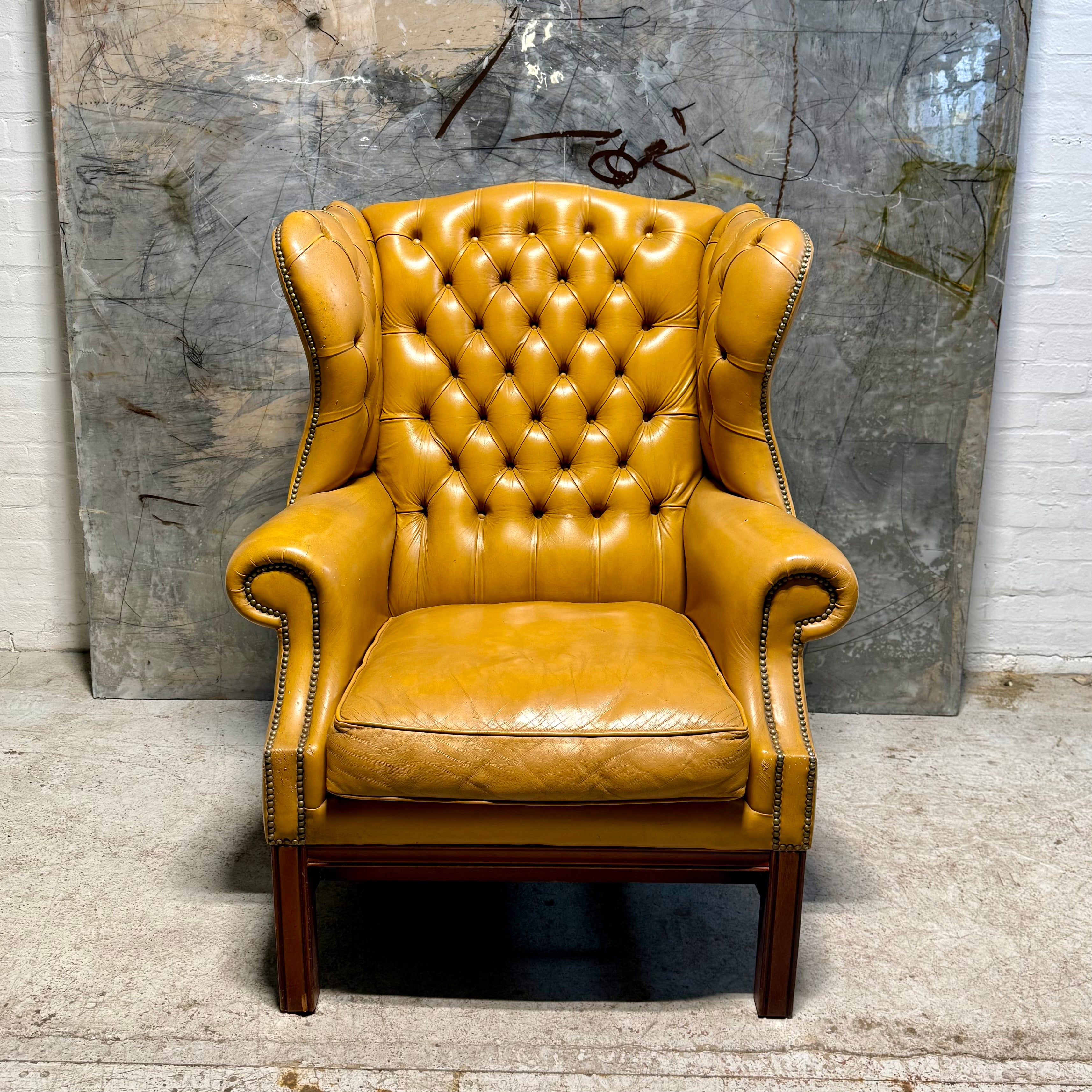 A HUGE Gentleman’s wing back chair at 100cm wide