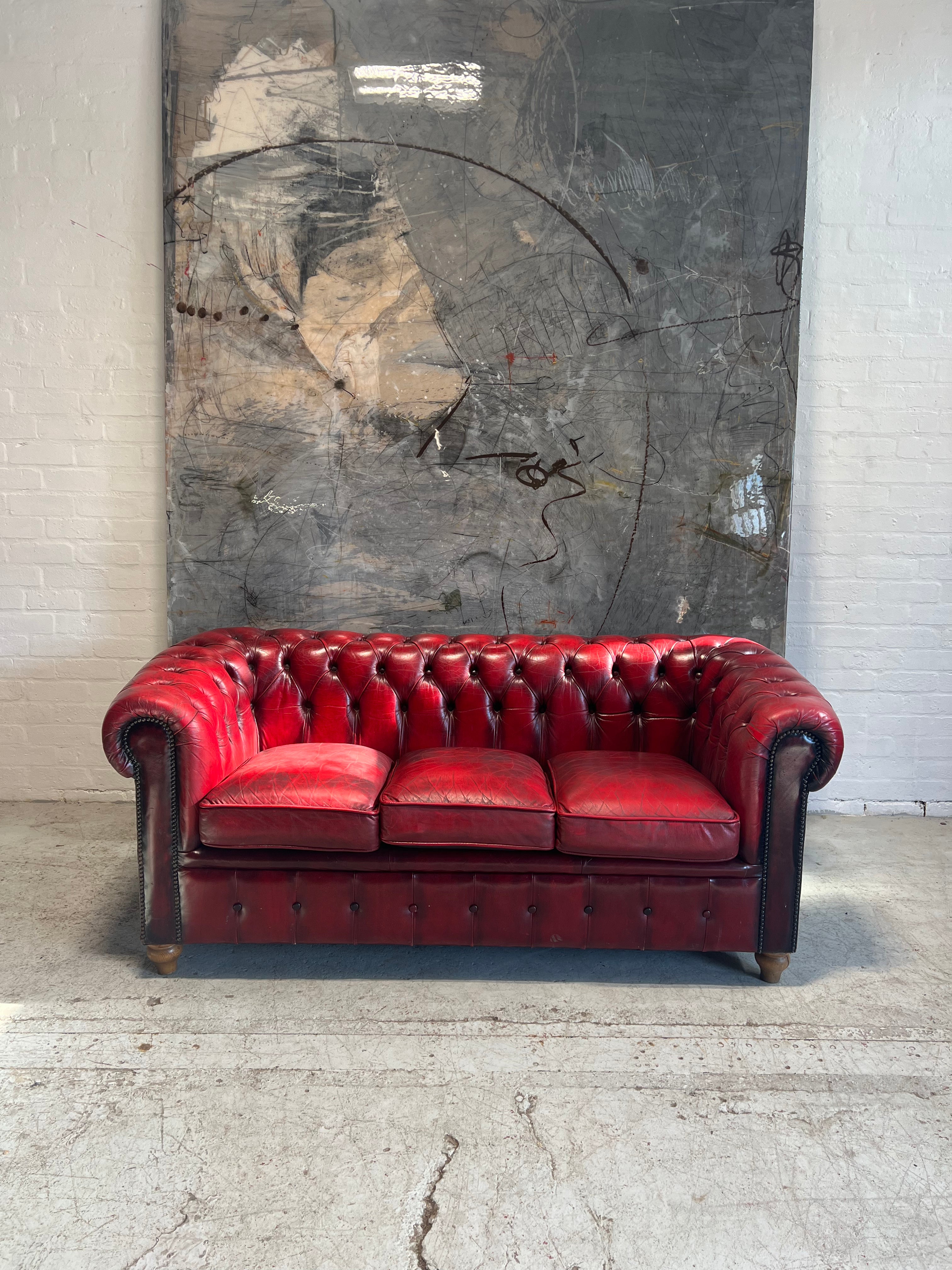 A Very Neat Red Leather Chesterfield Sofa only 30” deep