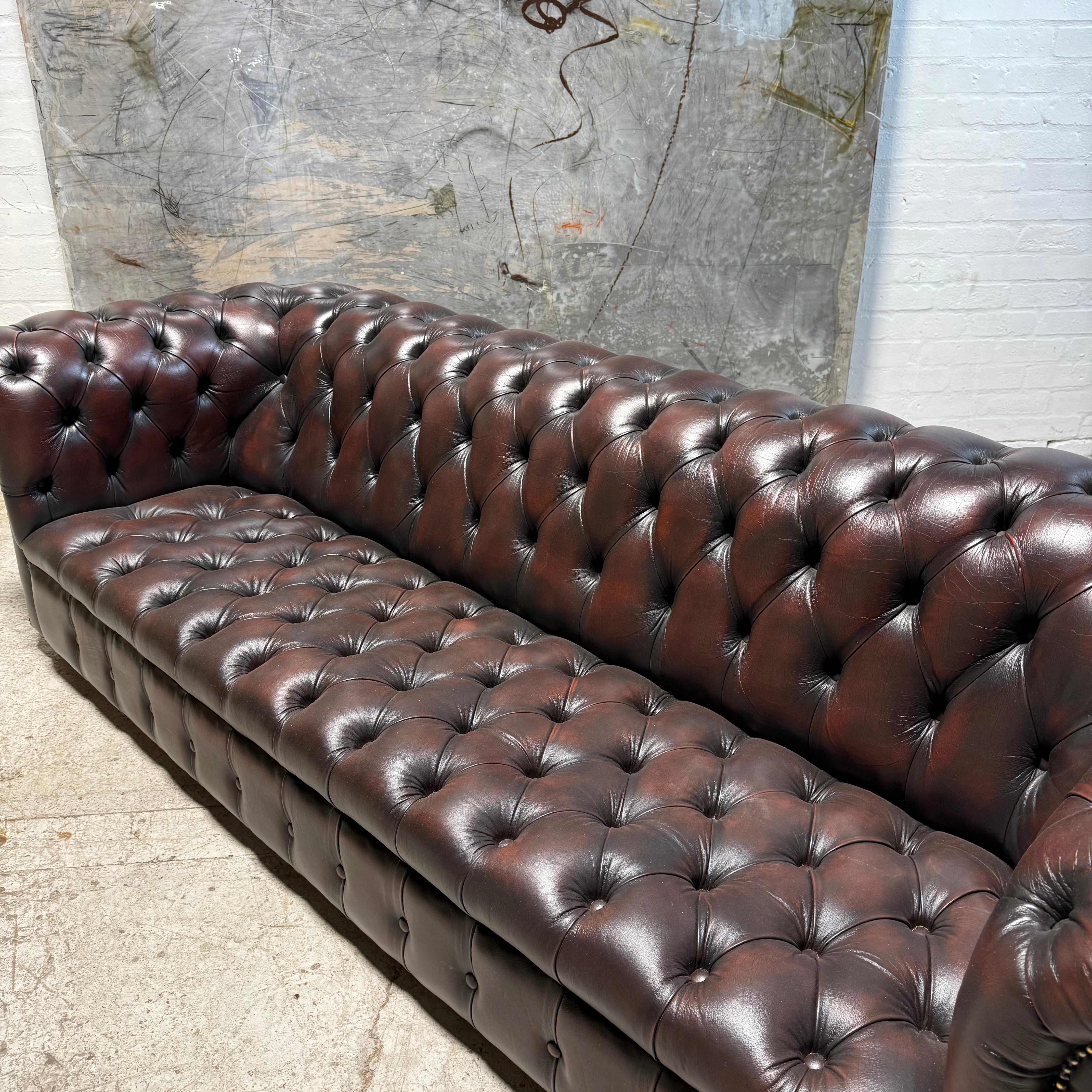 An Exceptional Second Hand Leather Chesterfield Sofa - 4 Seater in Dark Conker Brown