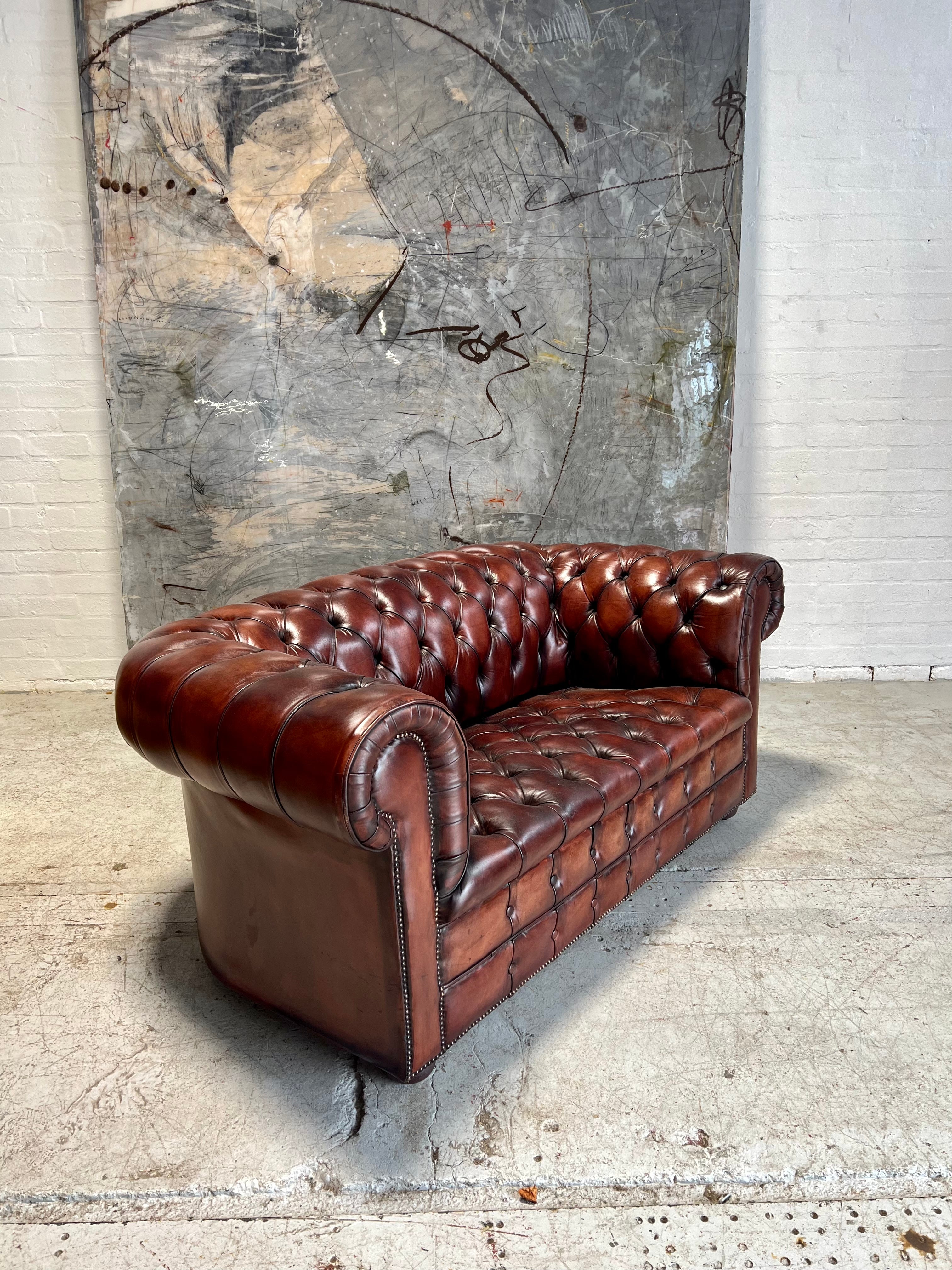 A Rich Chestnut Hand Dyed Vintage Leather Chesterfield Sofa