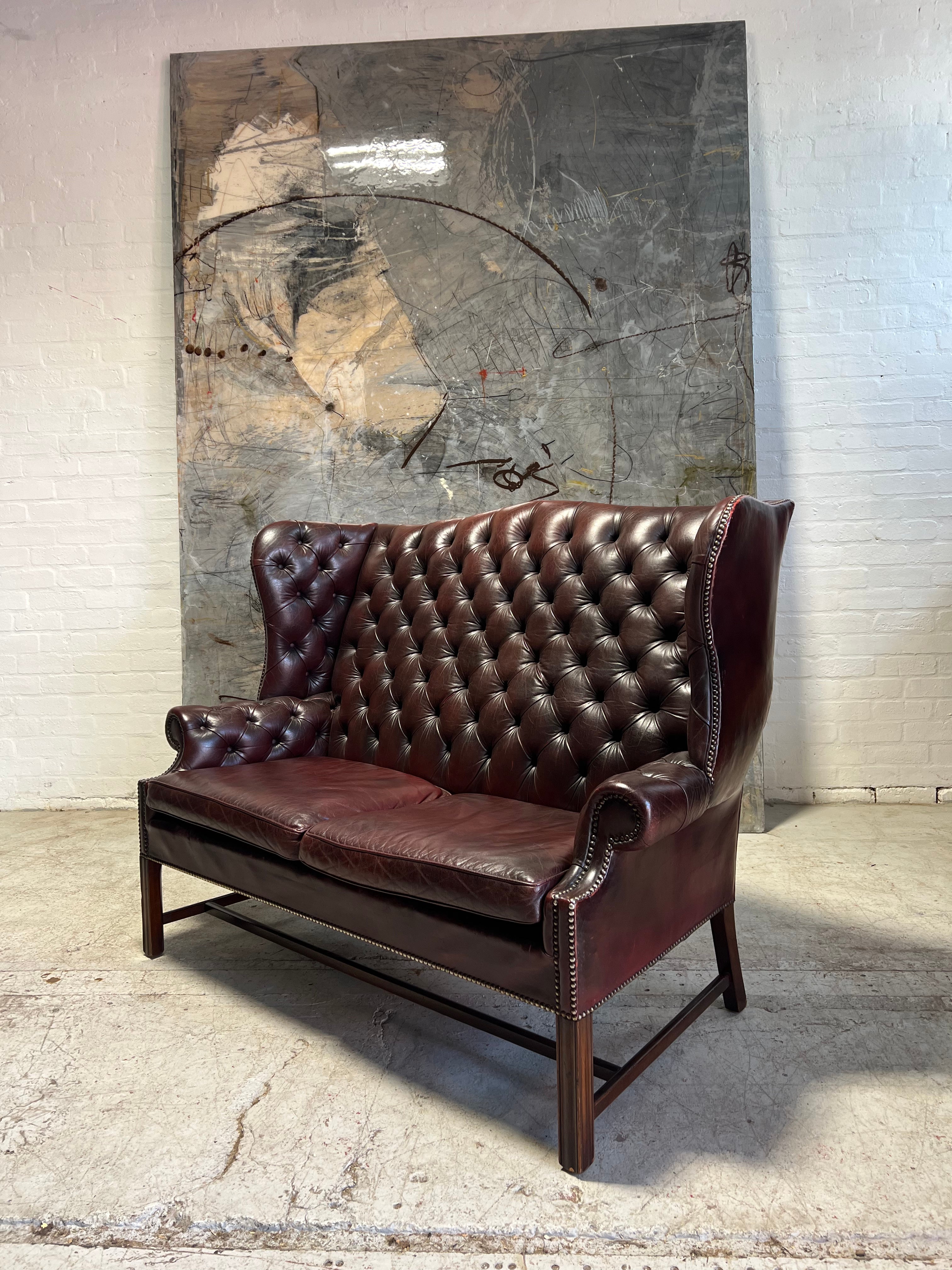 A Very Handsome MidC 2 Seat Wingback Chesterfield Sofa in Hand Dyed Wine Leathers