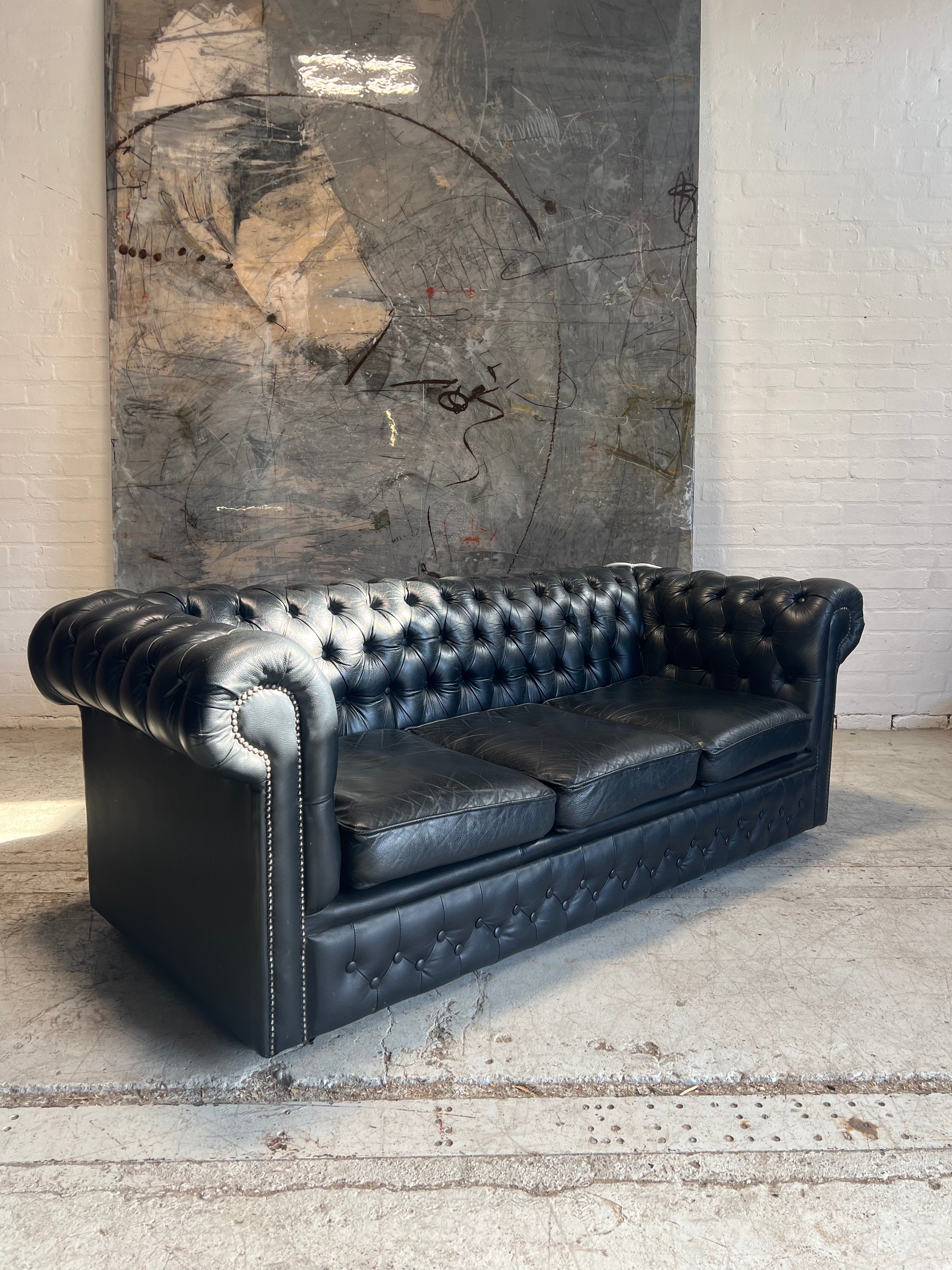 A Great Black Leather Chesterfield Sofa