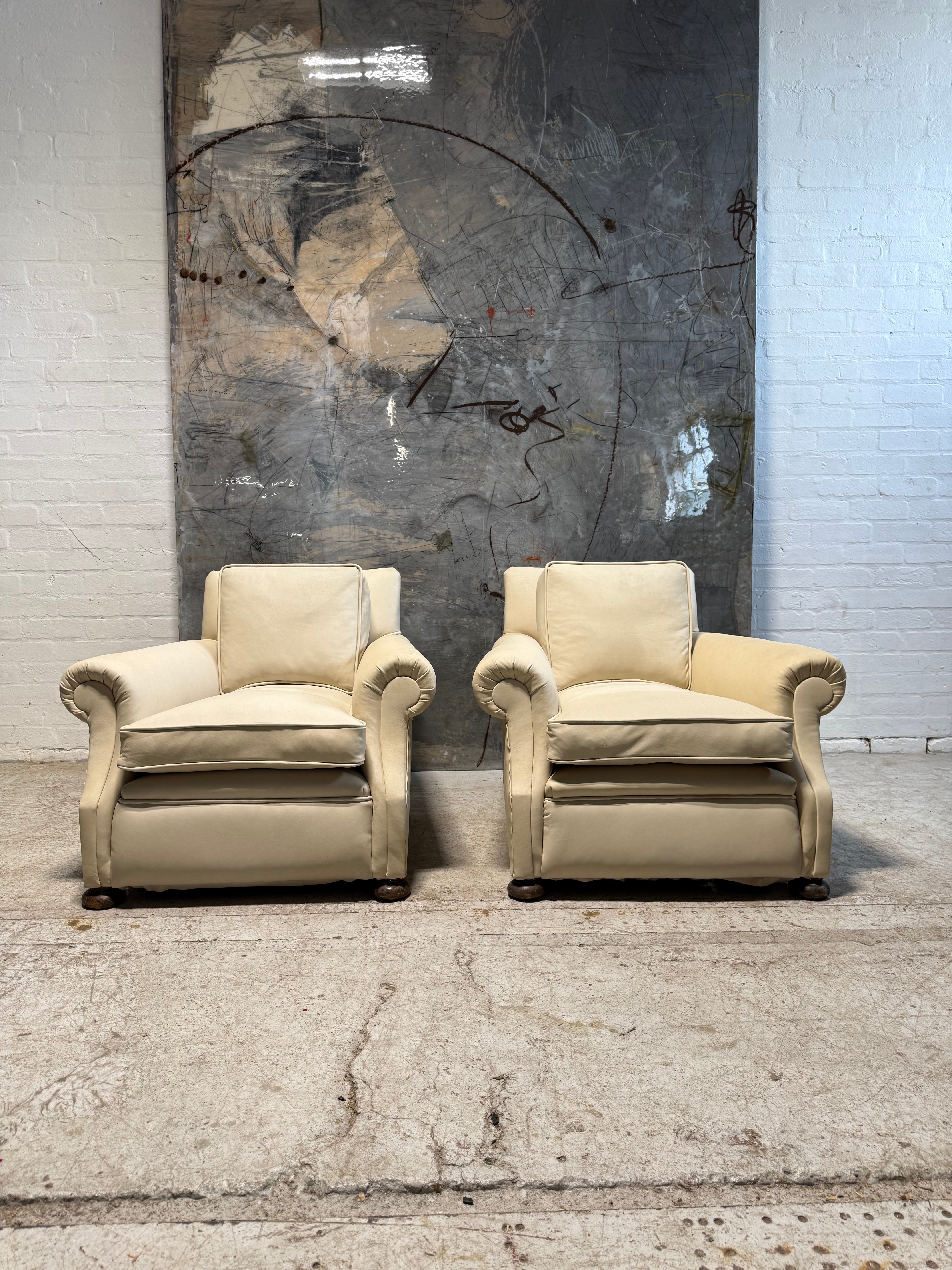 A Robust Pair of Edwardian Armchairs in Original Leather