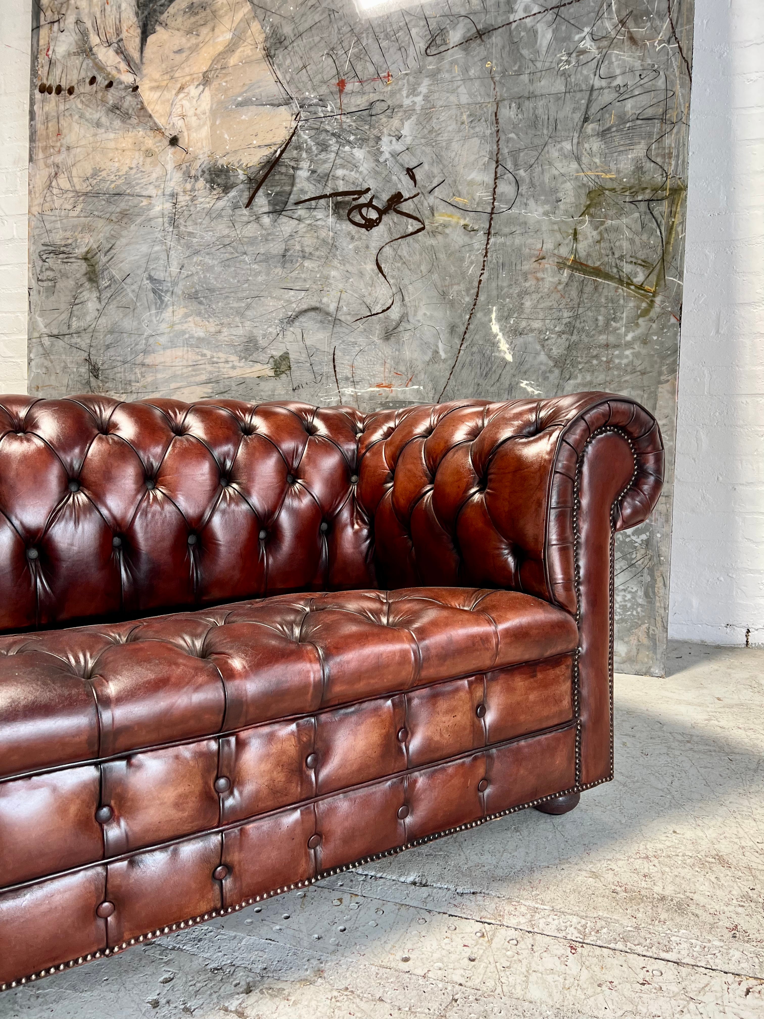 A Rich Chestnut Hand Dyed Vintage Leather Chesterfield Sofa