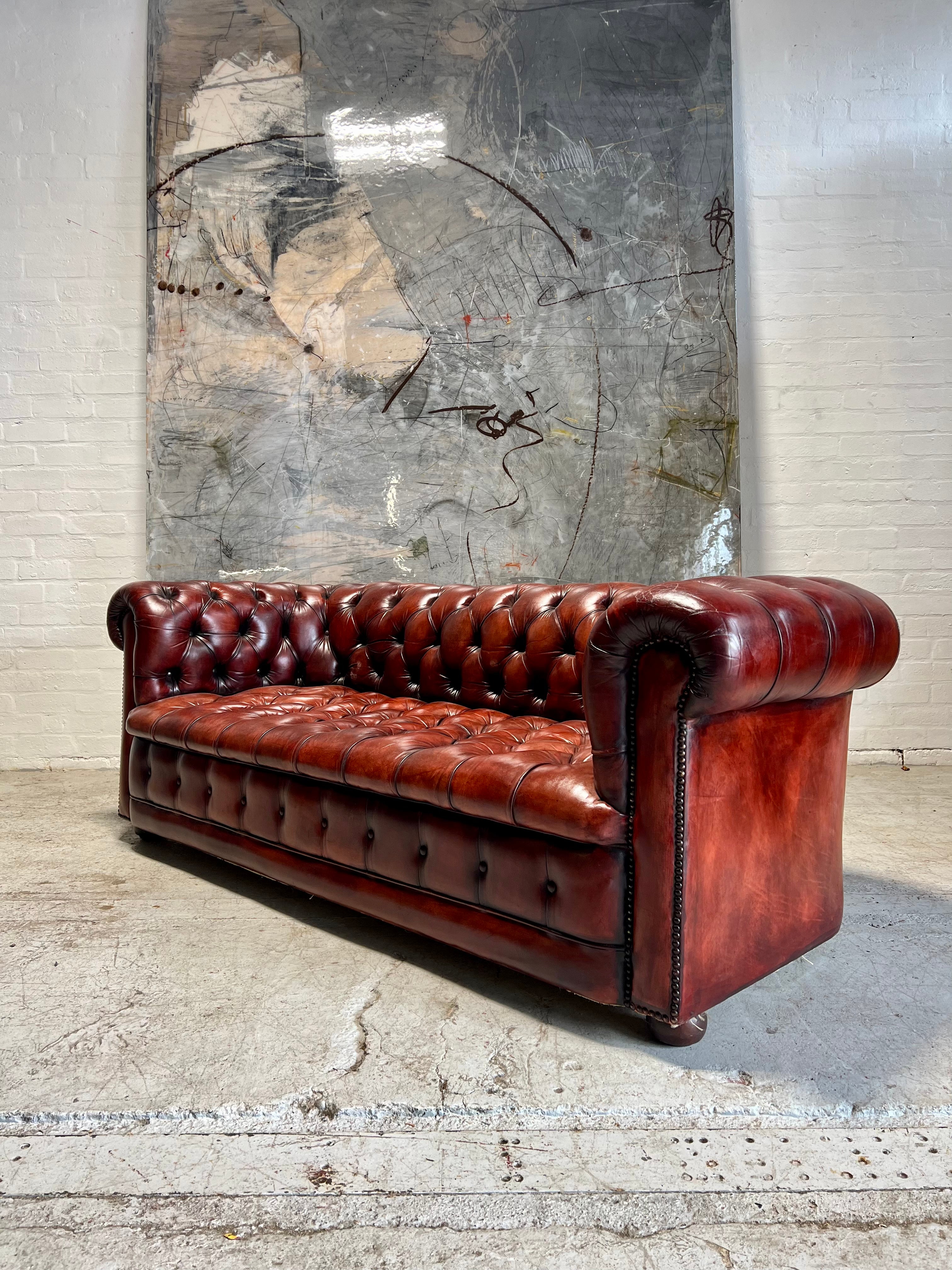 A Beautiful MidC Vintage Leather Chesterfield Sofa in Hand Dyed Cognac