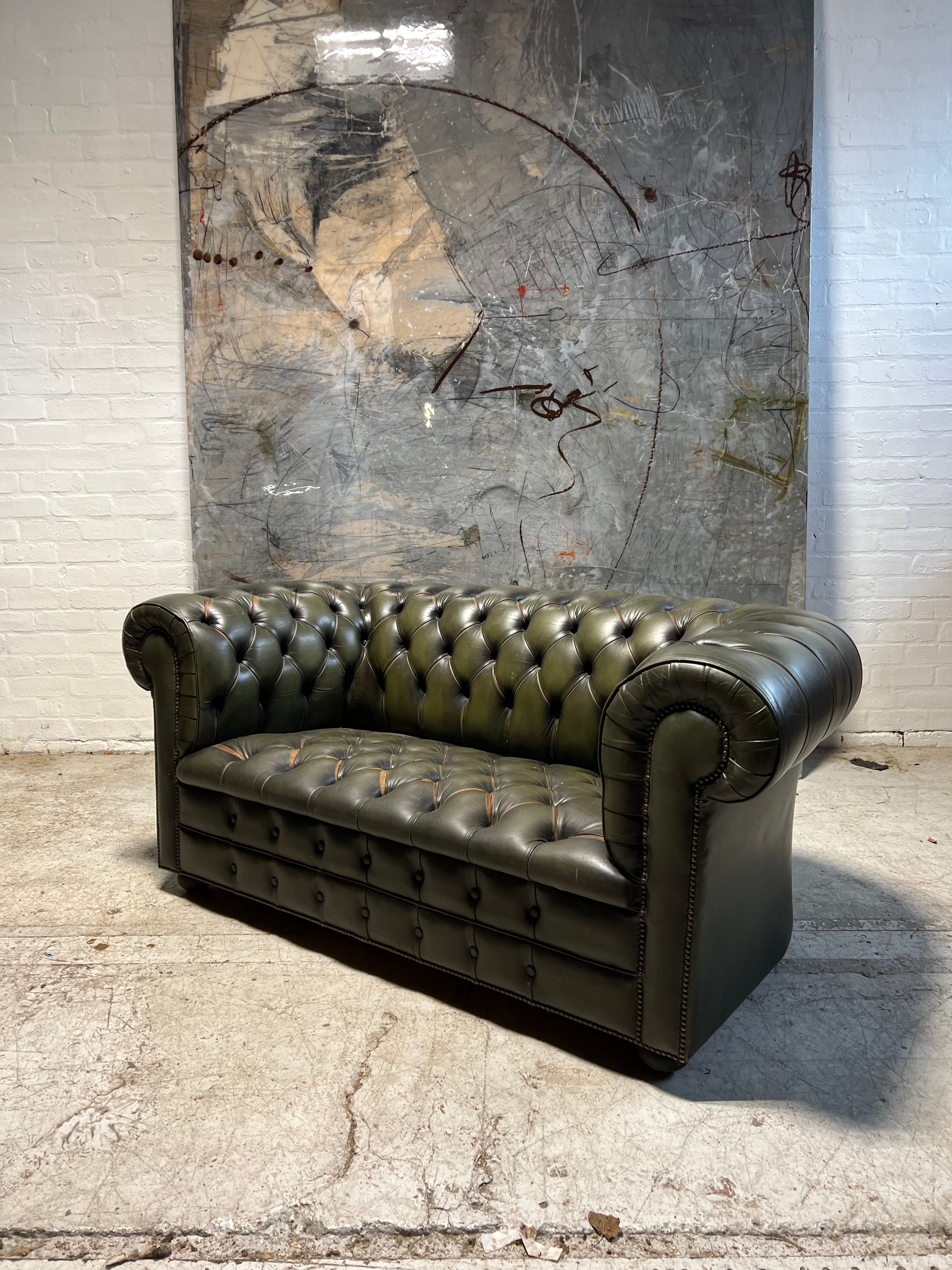 A Very Smart Hand Dyed Leather Chesterfield Sofa