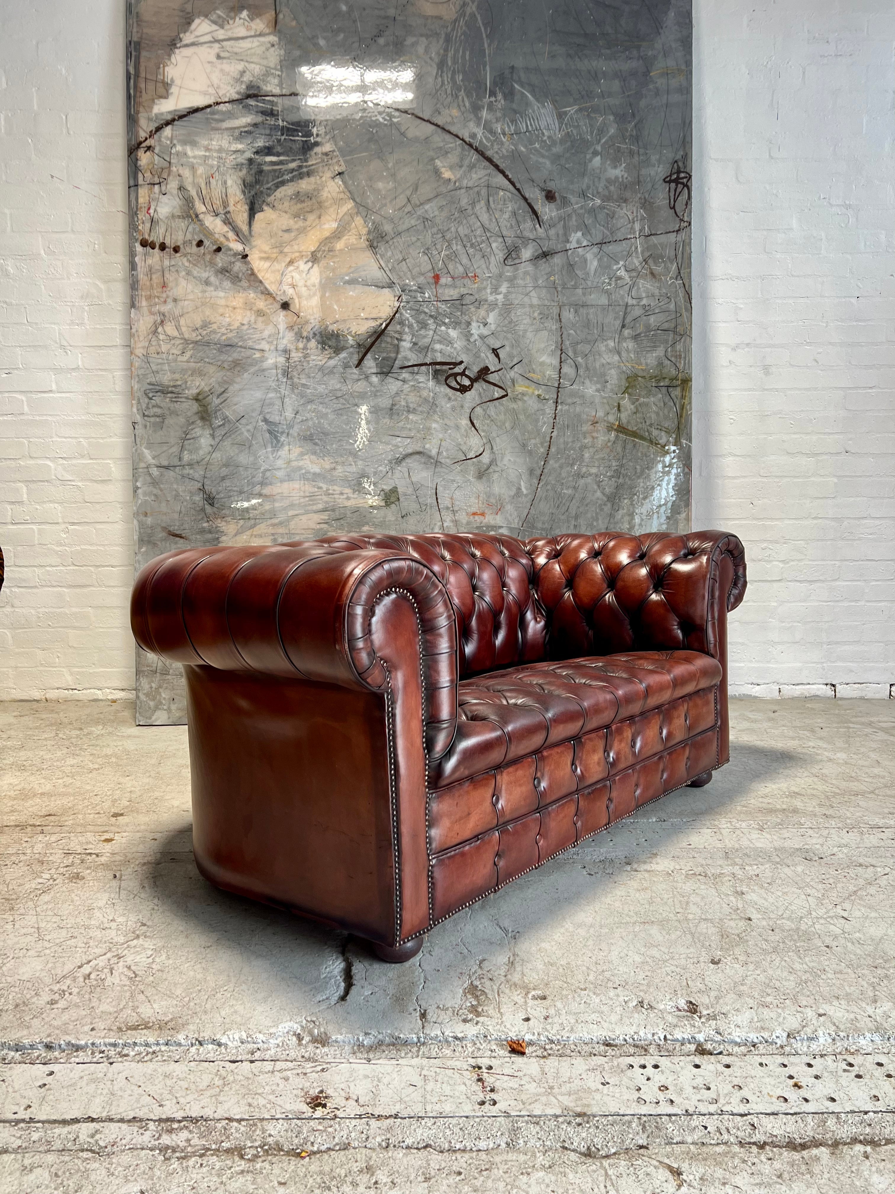 A Rich Chestnut Hand Dyed Vintage Leather Chesterfield Sofa