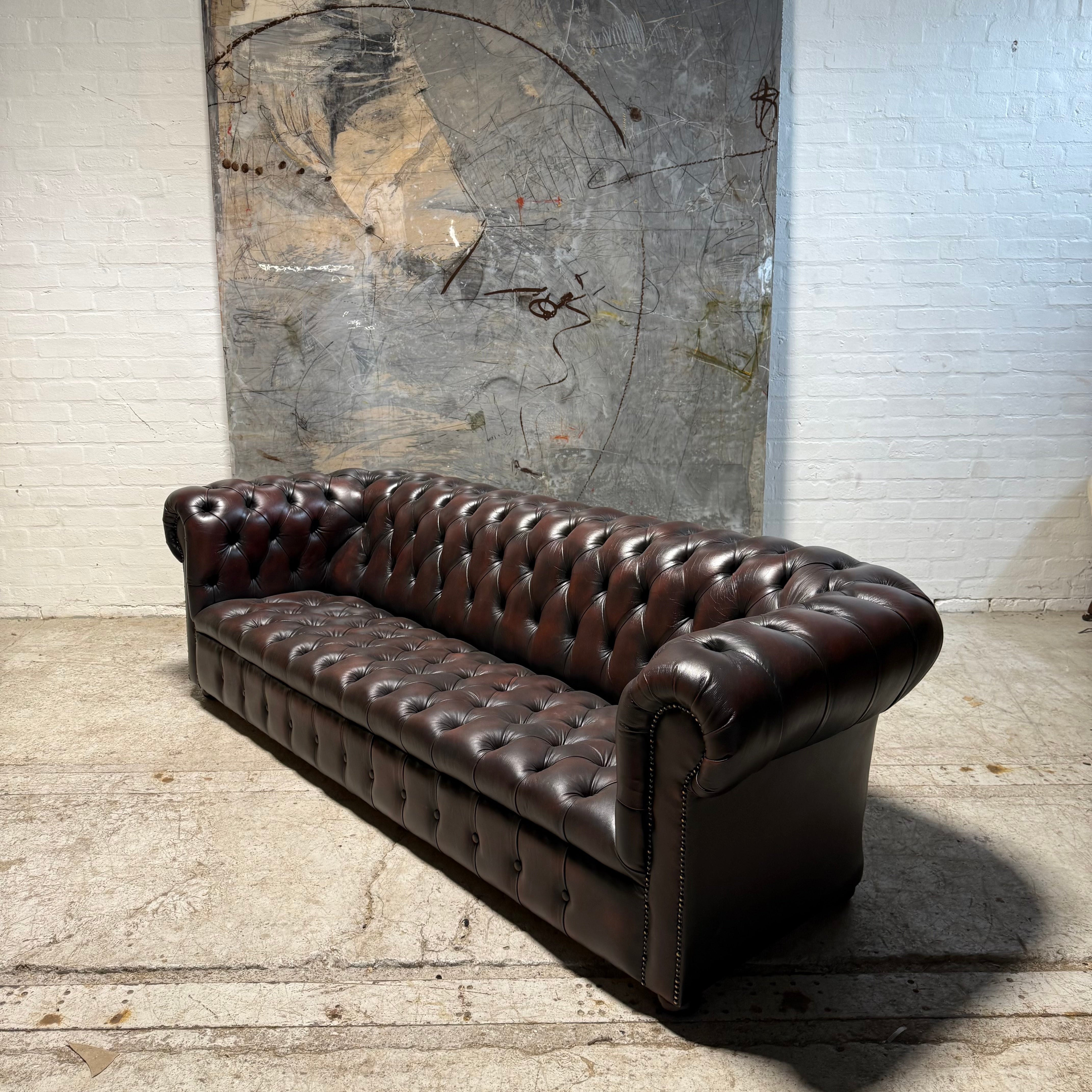 An Exceptional Second Hand Leather Chesterfield Sofa - 4 Seater in Dark Conker Brown
