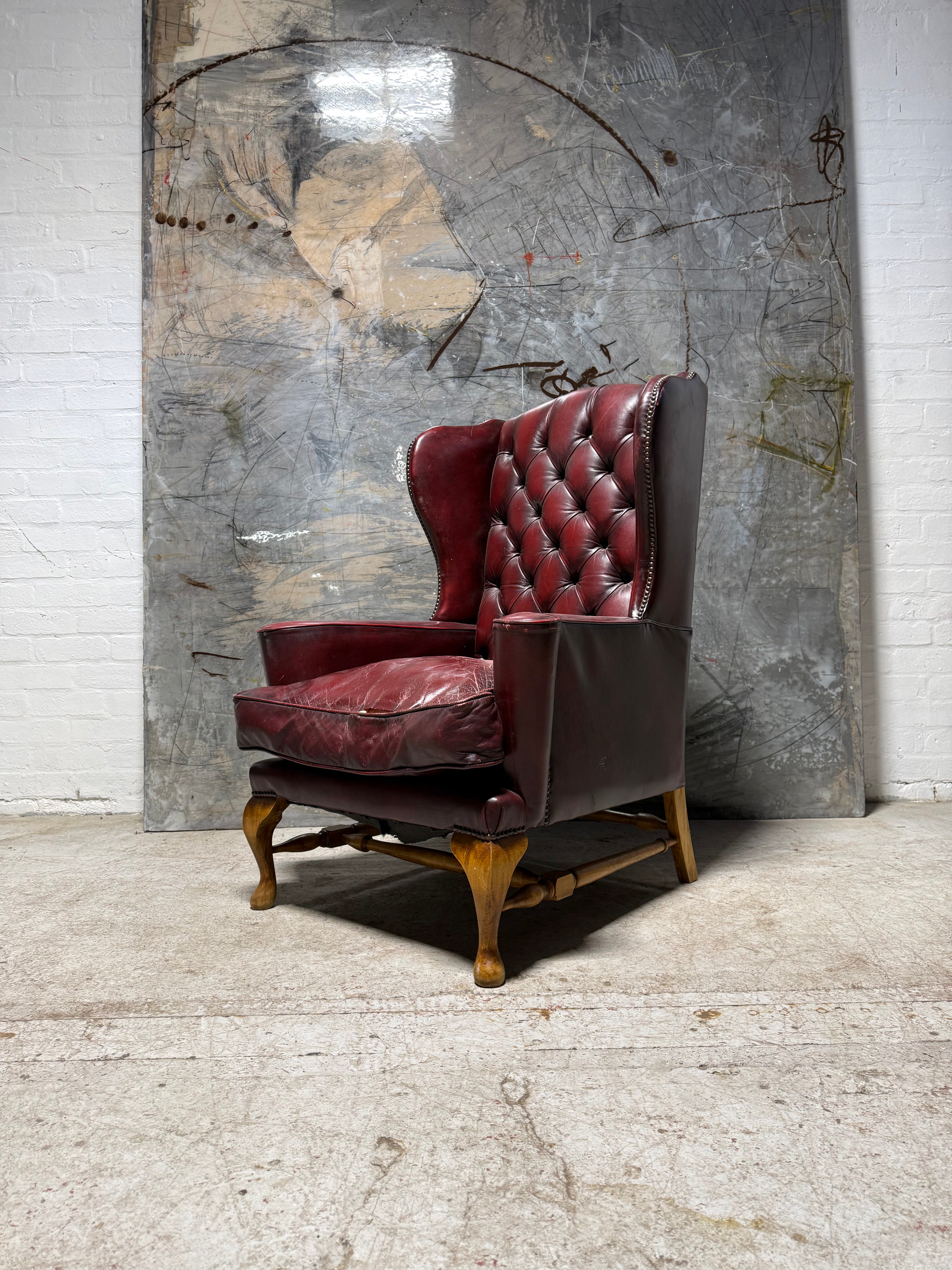 Beautiful Gentleman’s Leather Wing Back Armchair With Turned “H” Frame