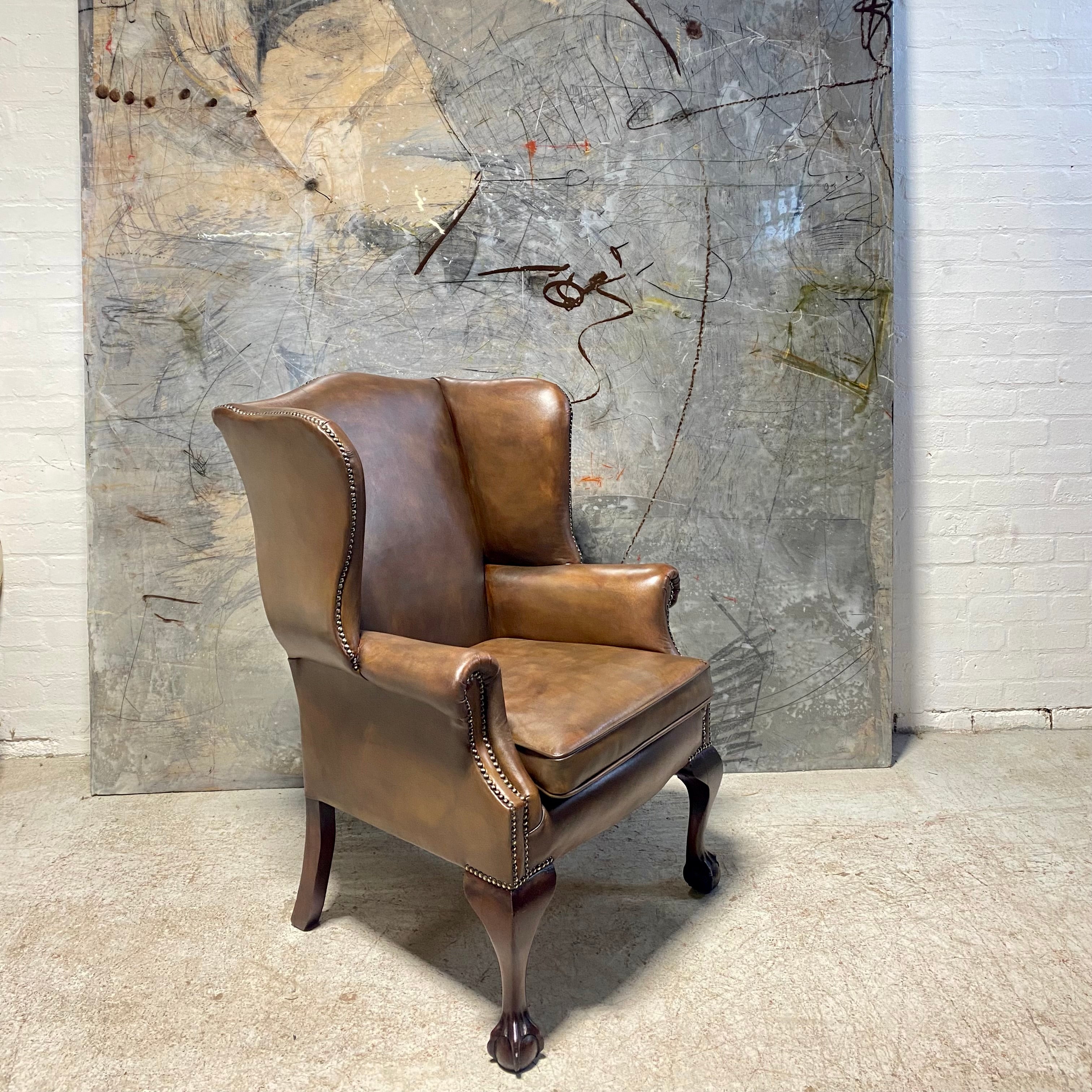 A Beautifully Restored MidC Vintage Gentleman’s Wing Back Chair in Hand Dyed Leather