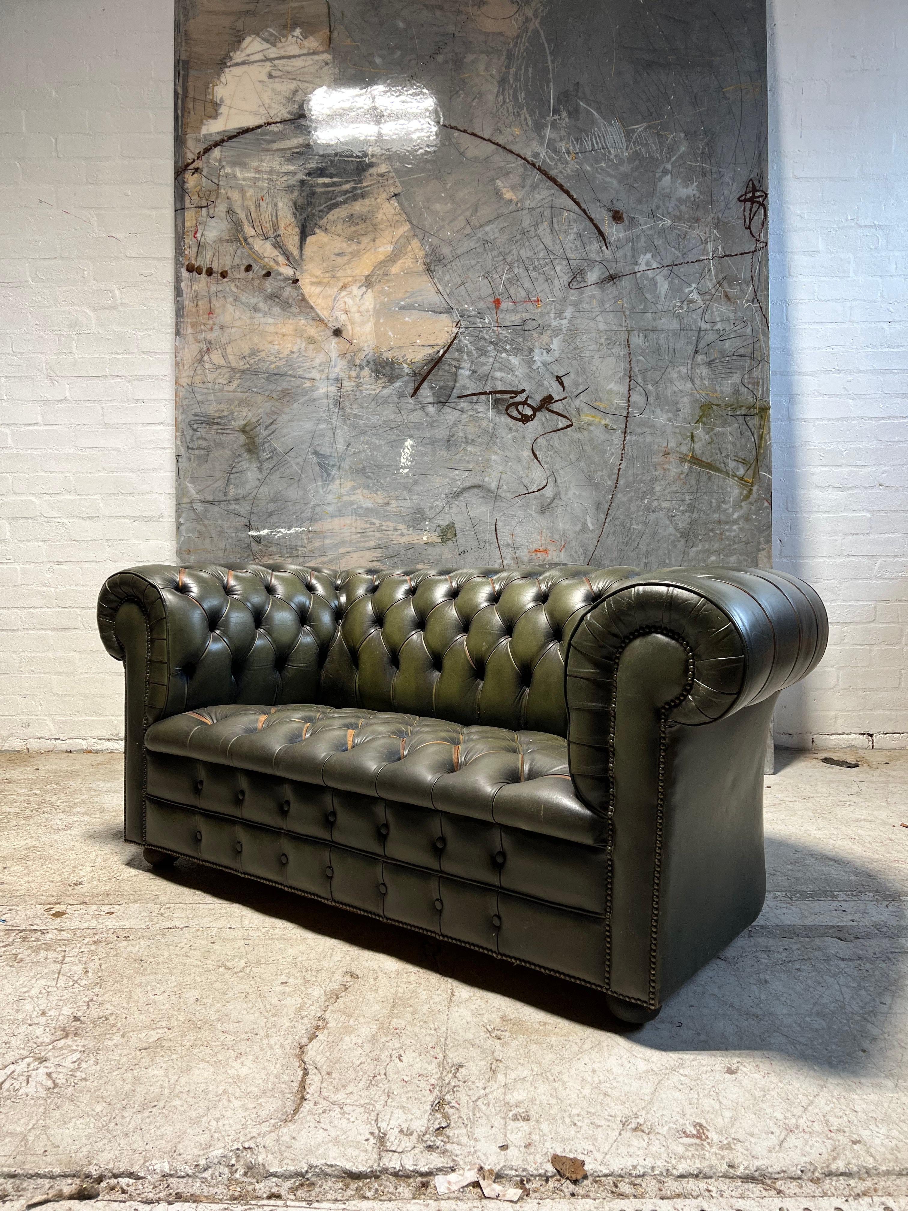 A Very Smart Hand Dyed Leather Chesterfield Sofa