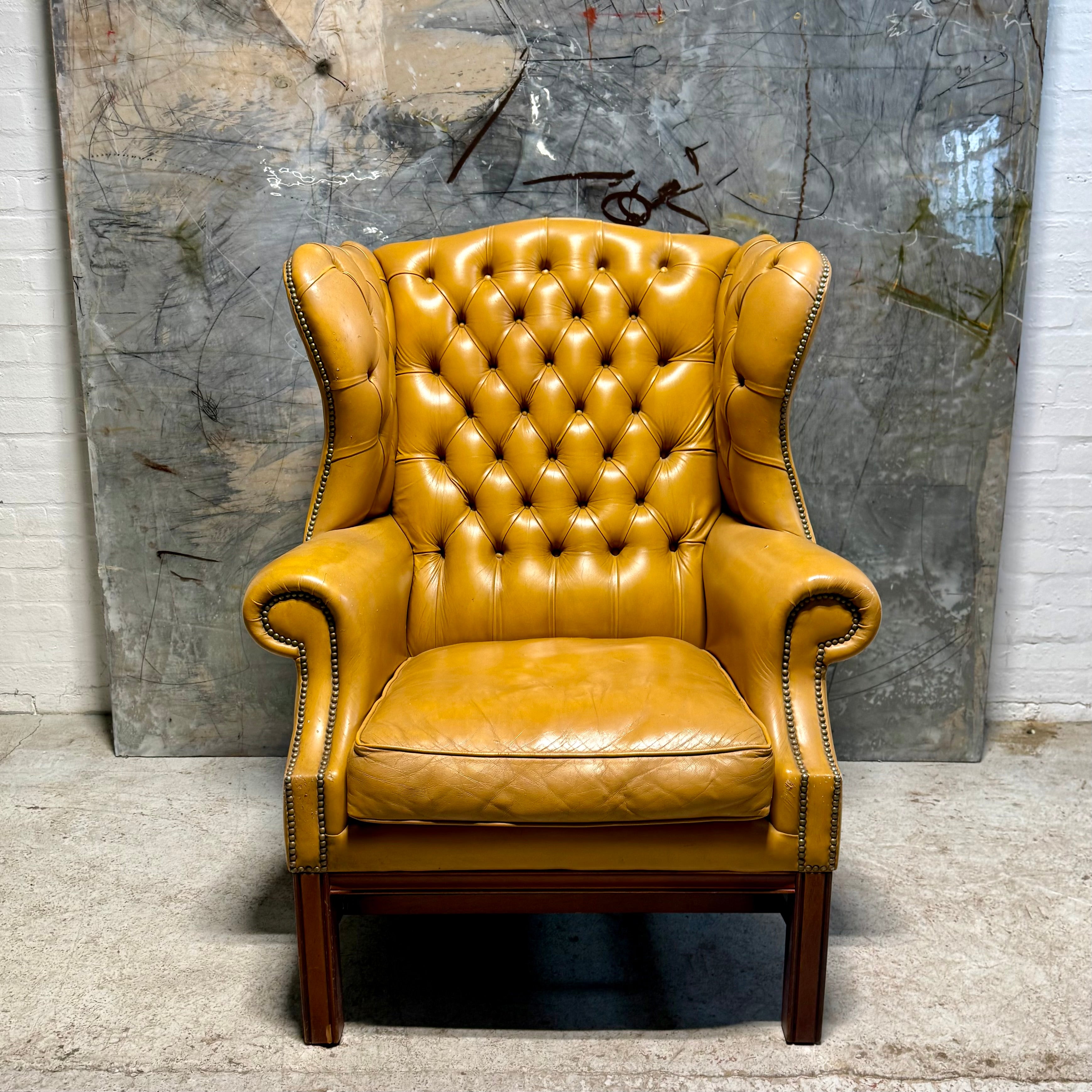 A HUGE Gentleman’s wing back chair at 100cm wide