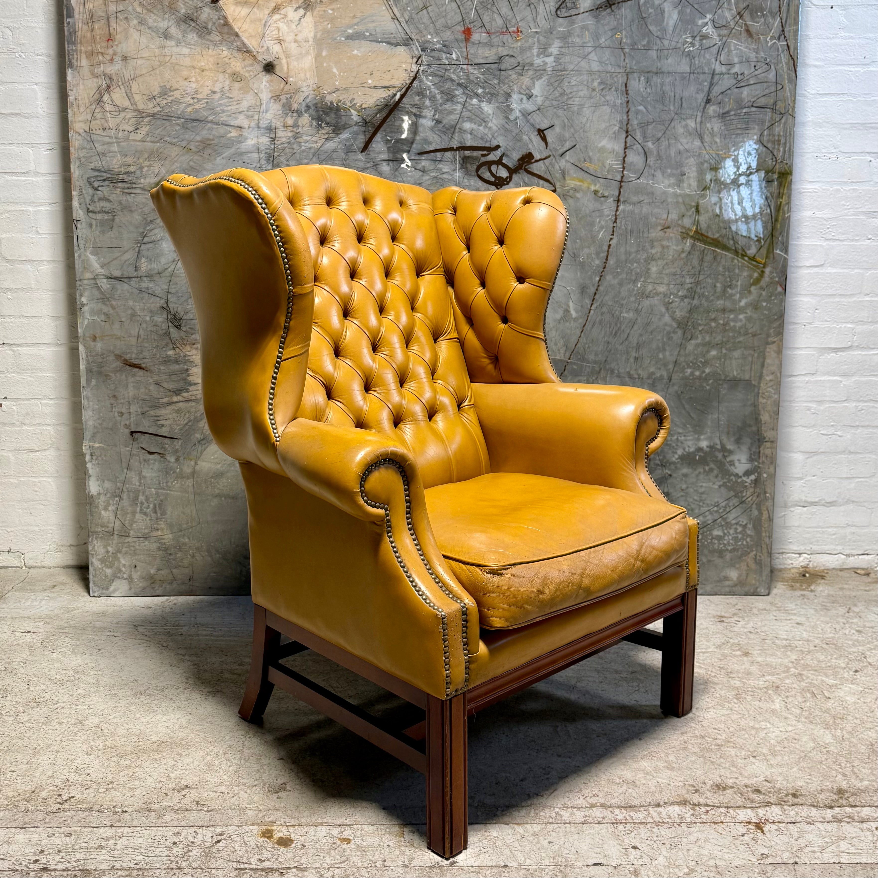 A HUGE Gentleman’s wing back chair at 100cm wide