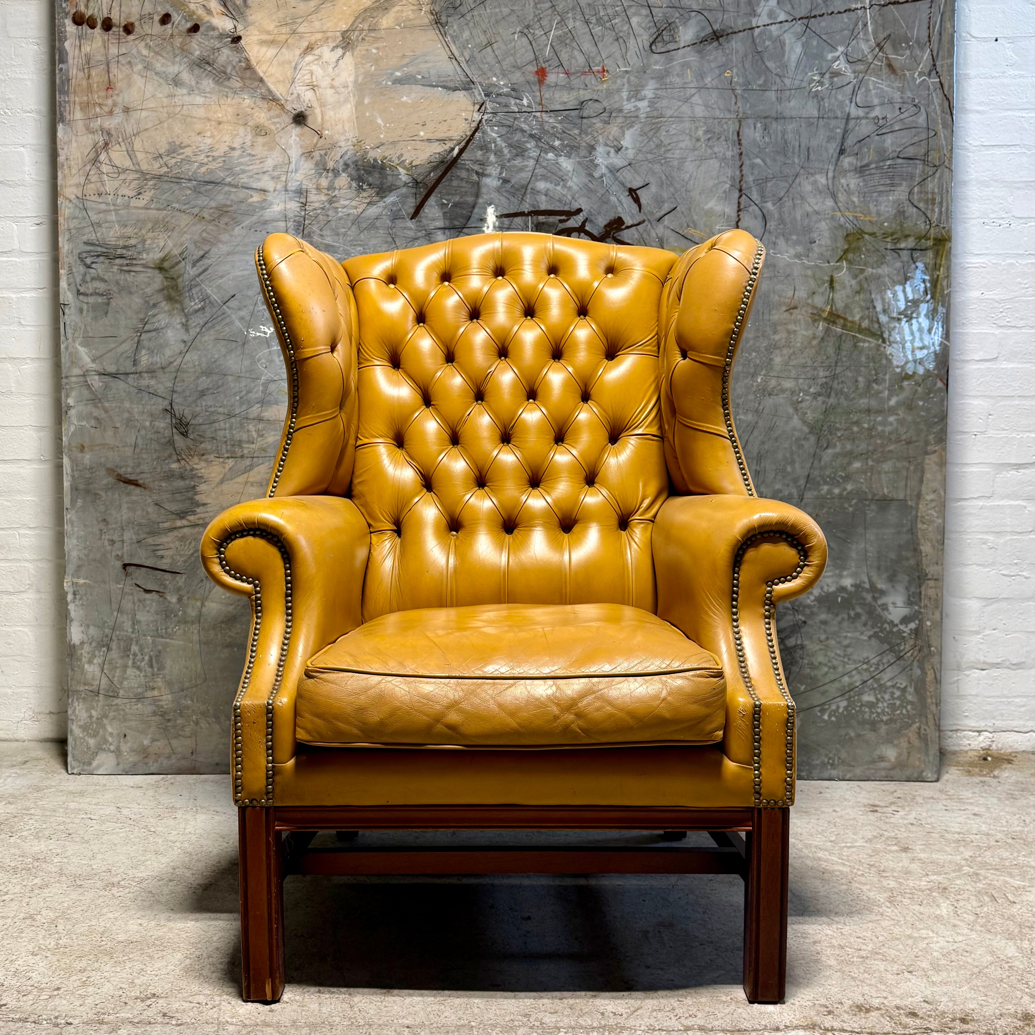 A HUGE Gentleman’s wing back chair at 100cm wide