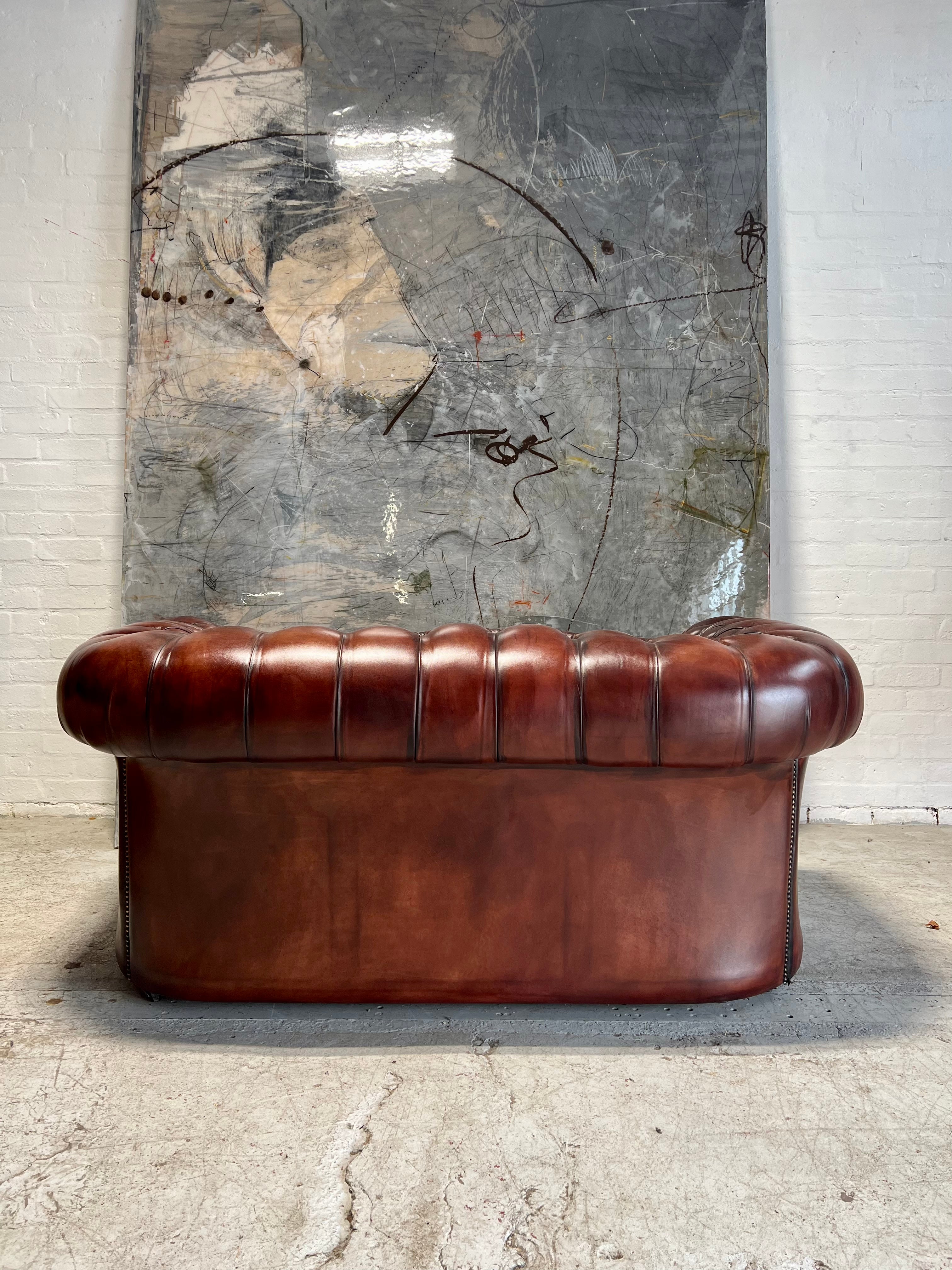 A Rich Chestnut Hand Dyed Vintage Leather Chesterfield Sofa