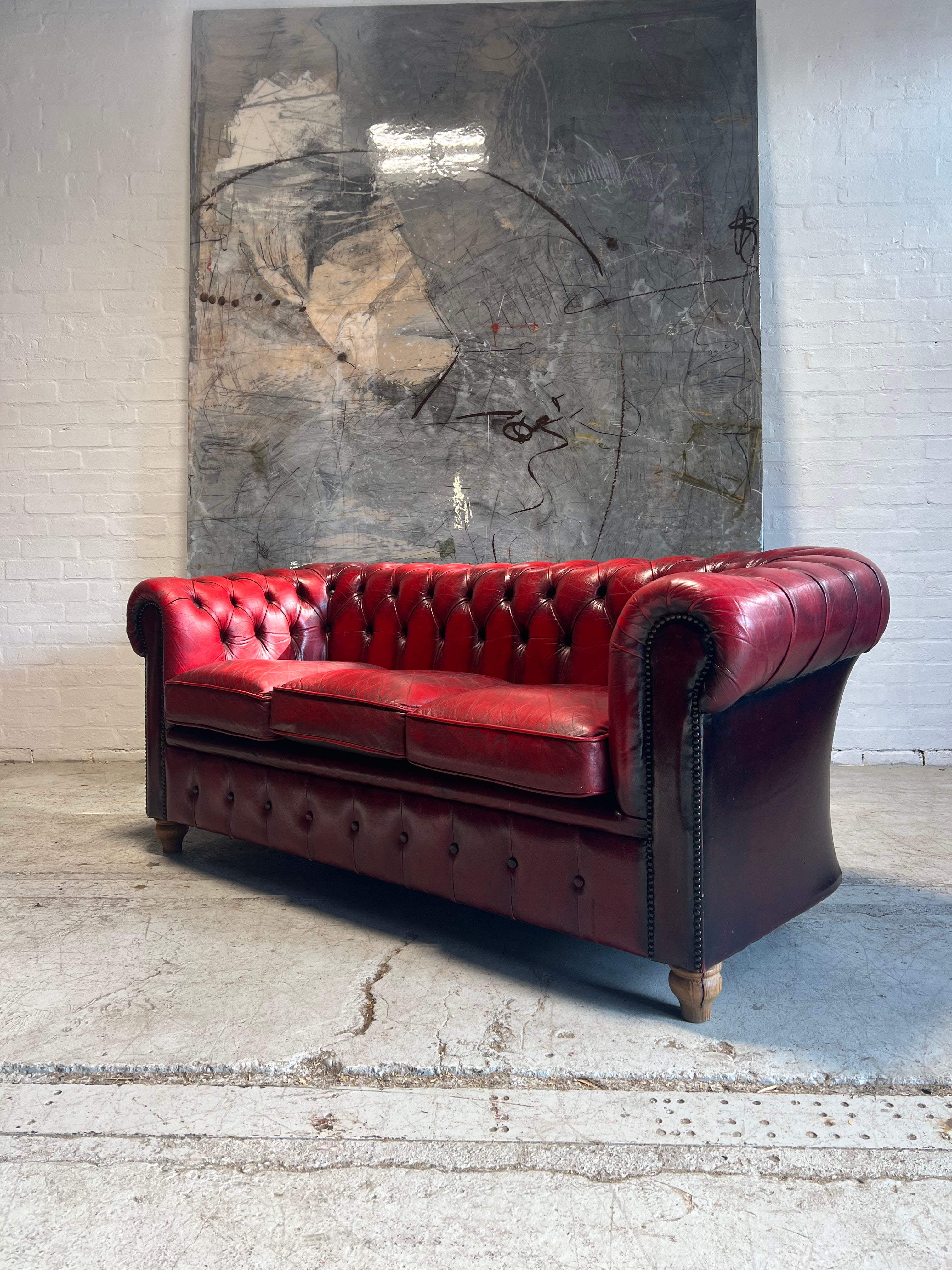 A Very Neat Red Leather Chesterfield Sofa only 30” deep