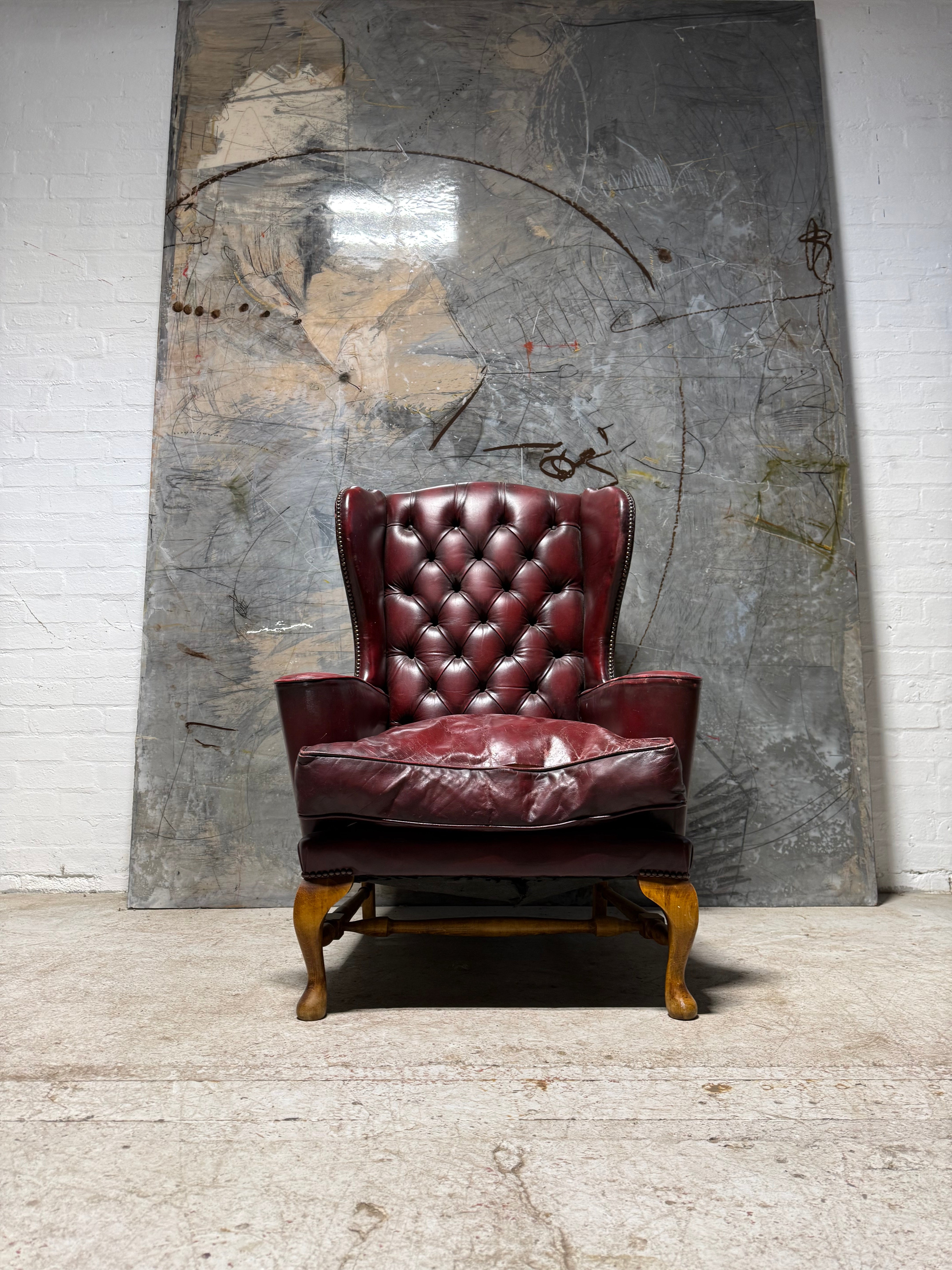 Beautiful Gentleman’s Leather Wing Back Armchair With Turned “H” Frame
