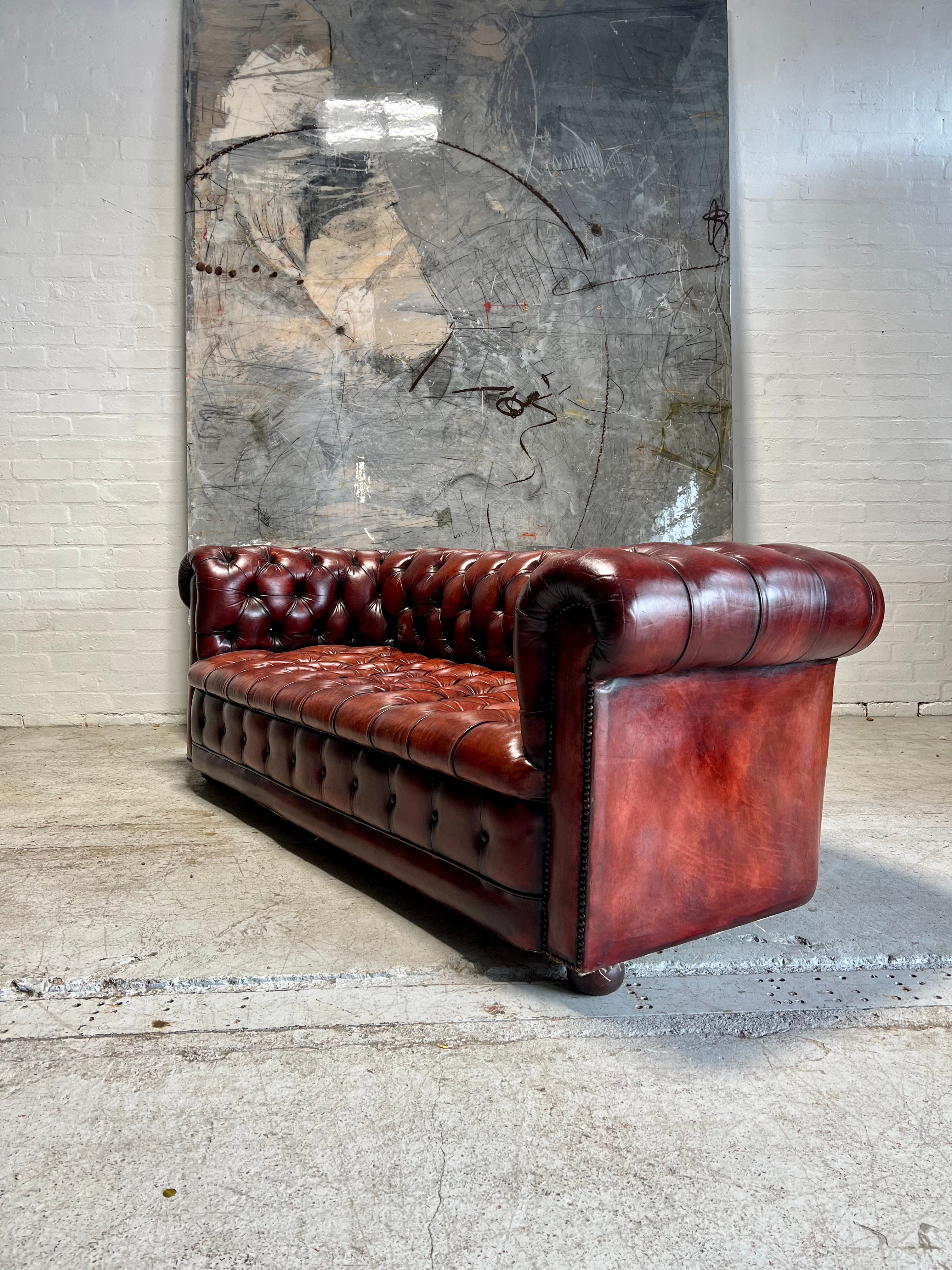 A Beautiful MidC Vintage Leather Chesterfield Sofa in Hand Dyed Cognac