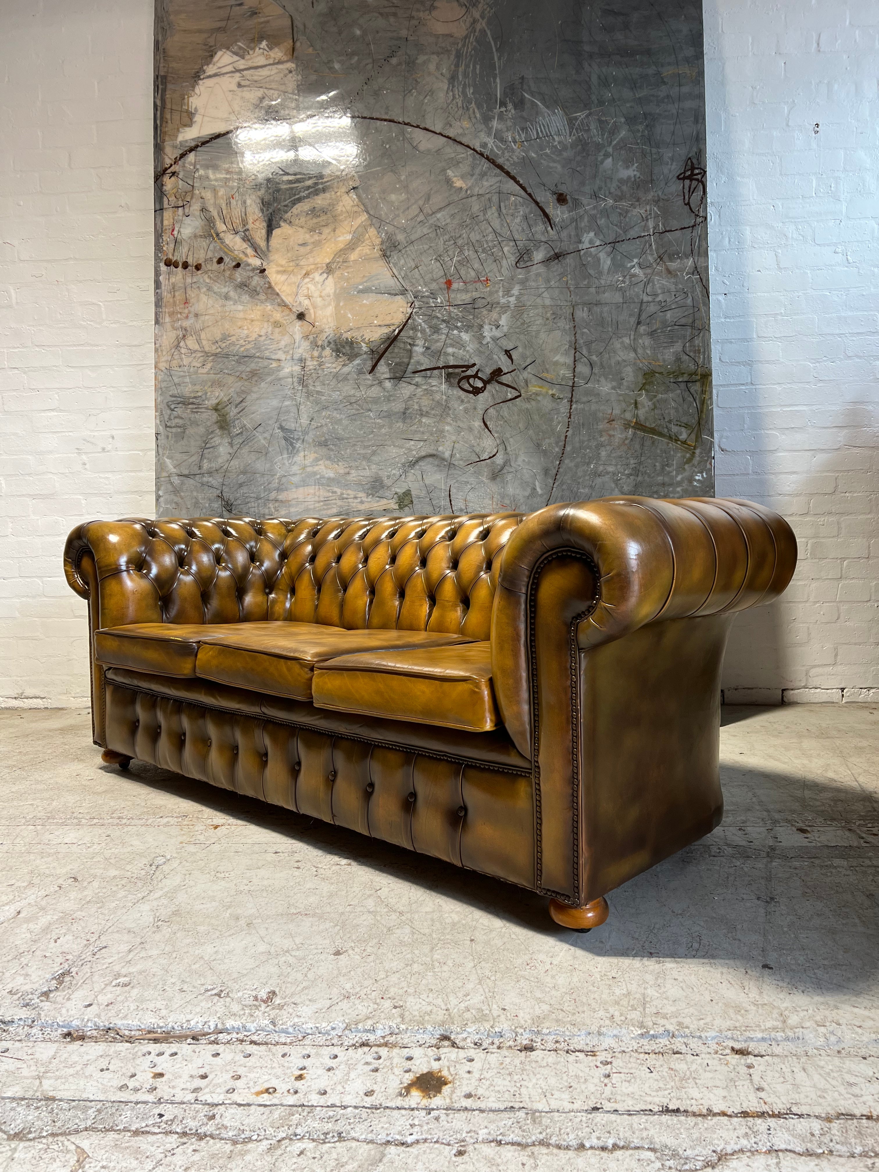 Beautifully Patinated MidC Chesterfield Sofa