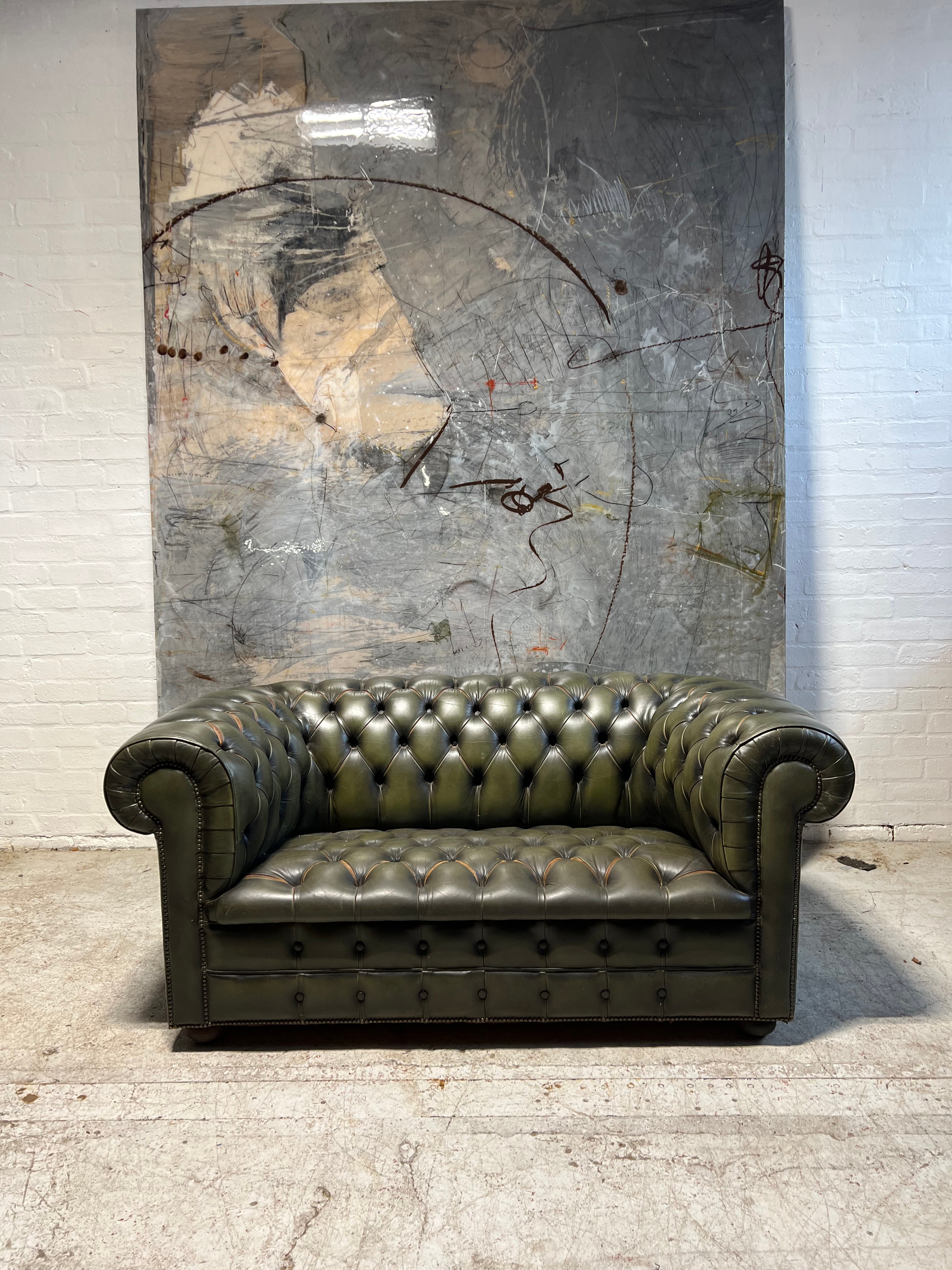 A Very Smart Hand Dyed Leather Chesterfield Sofa