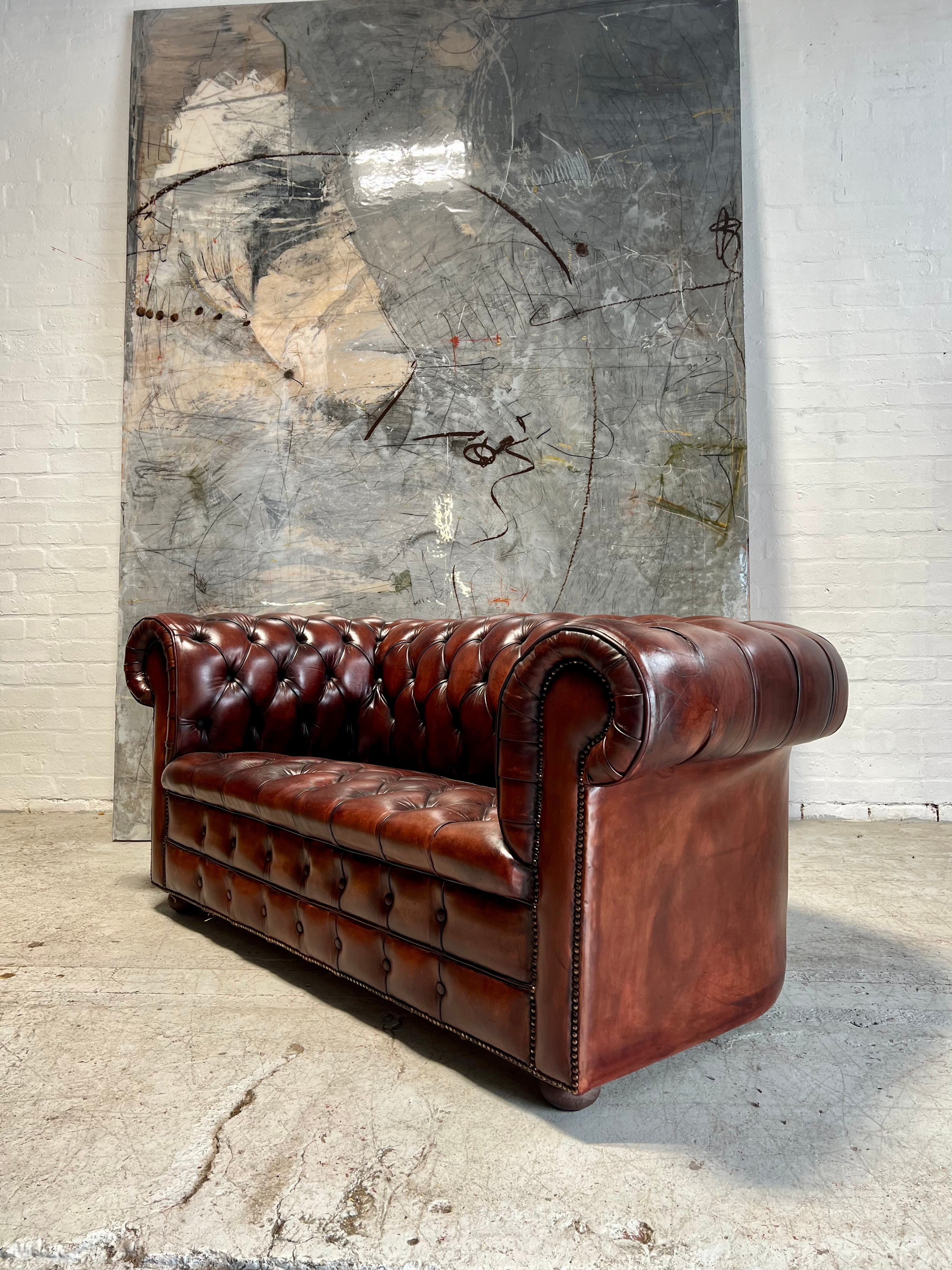 A Rich Chestnut Hand Dyed Vintage Leather Chesterfield Sofa