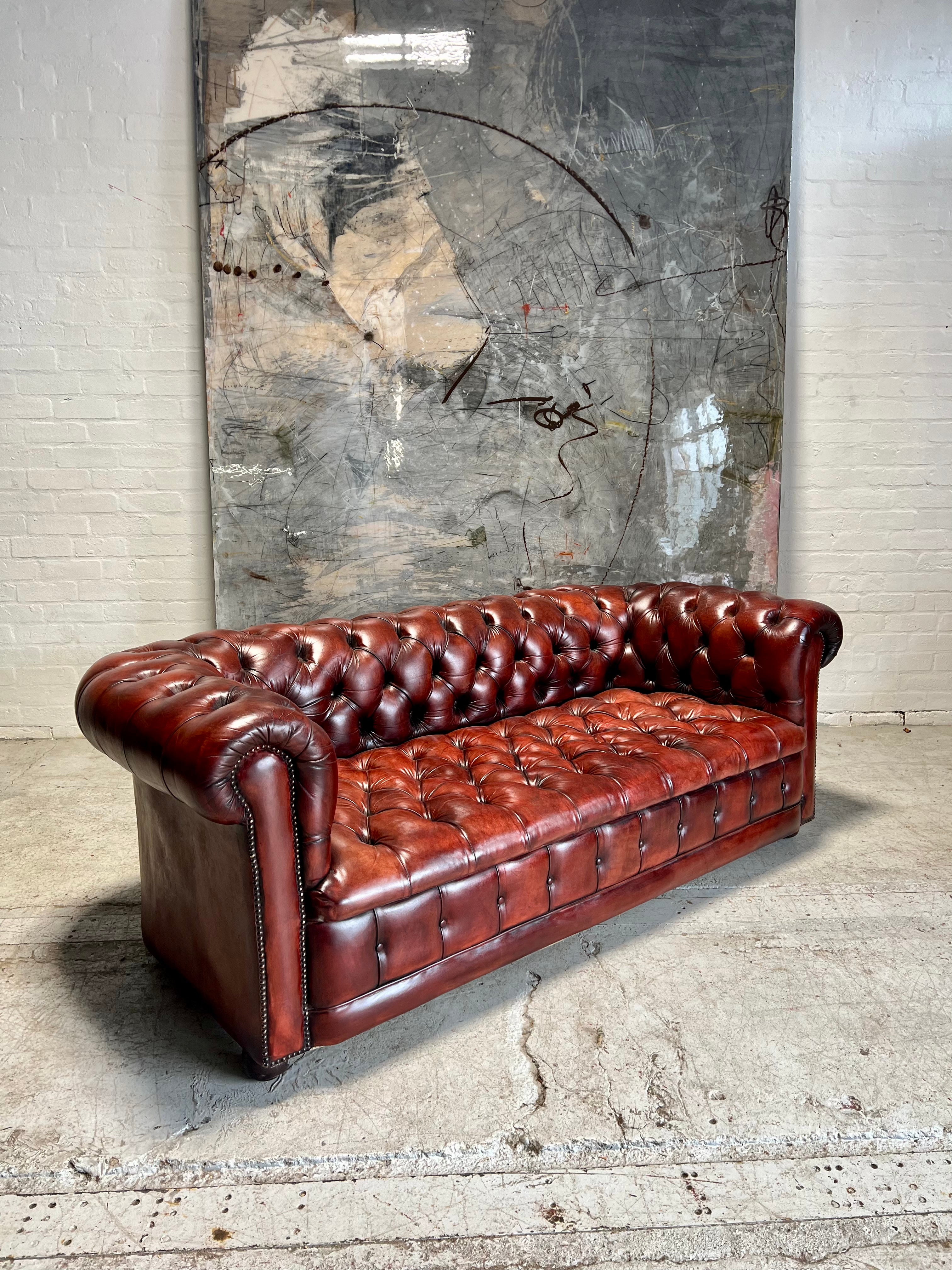 A Beautiful MidC Vintage Leather Chesterfield Sofa in Hand Dyed Cognac