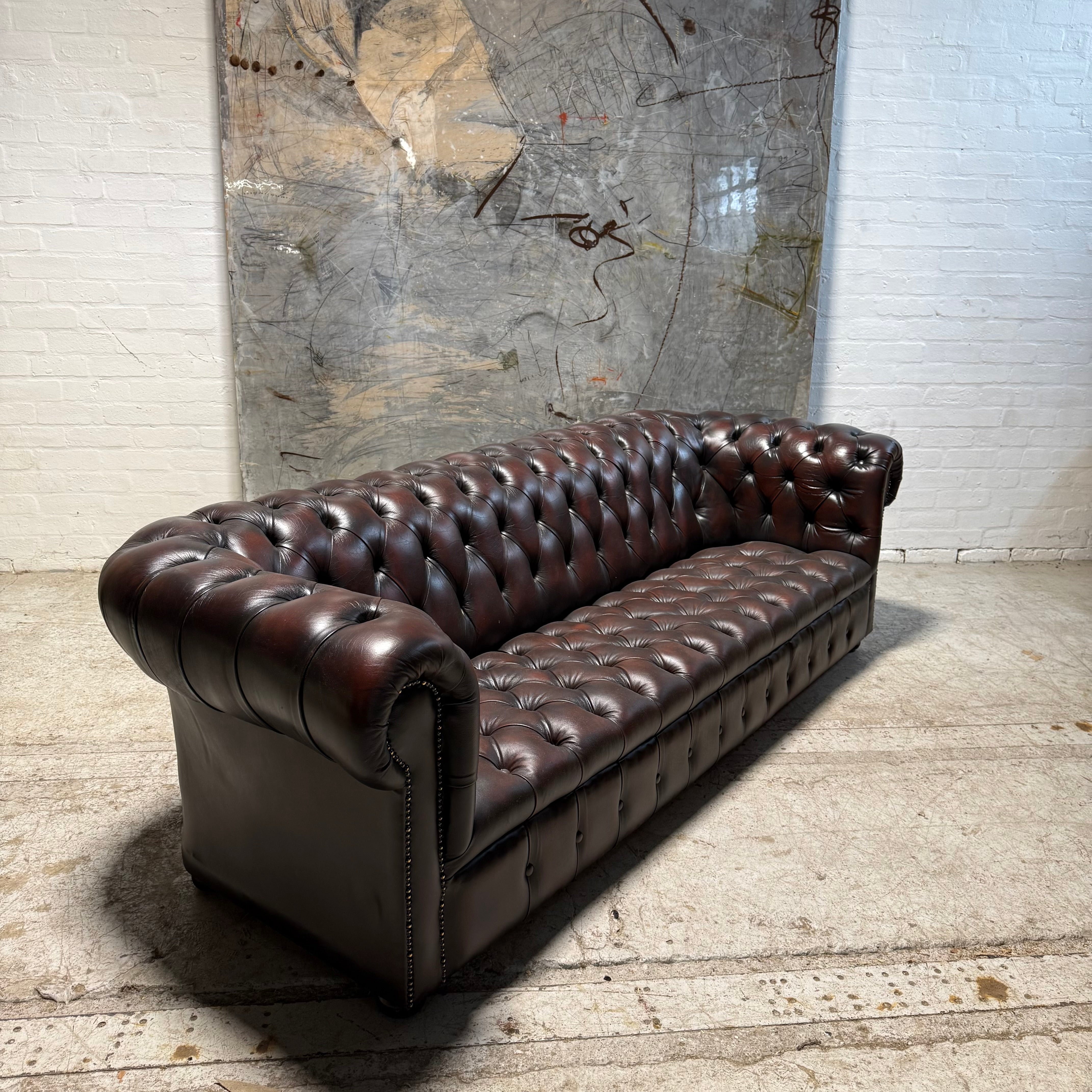 An Exceptional Second Hand Leather Chesterfield Sofa - 4 Seater in Dark Conker Brown