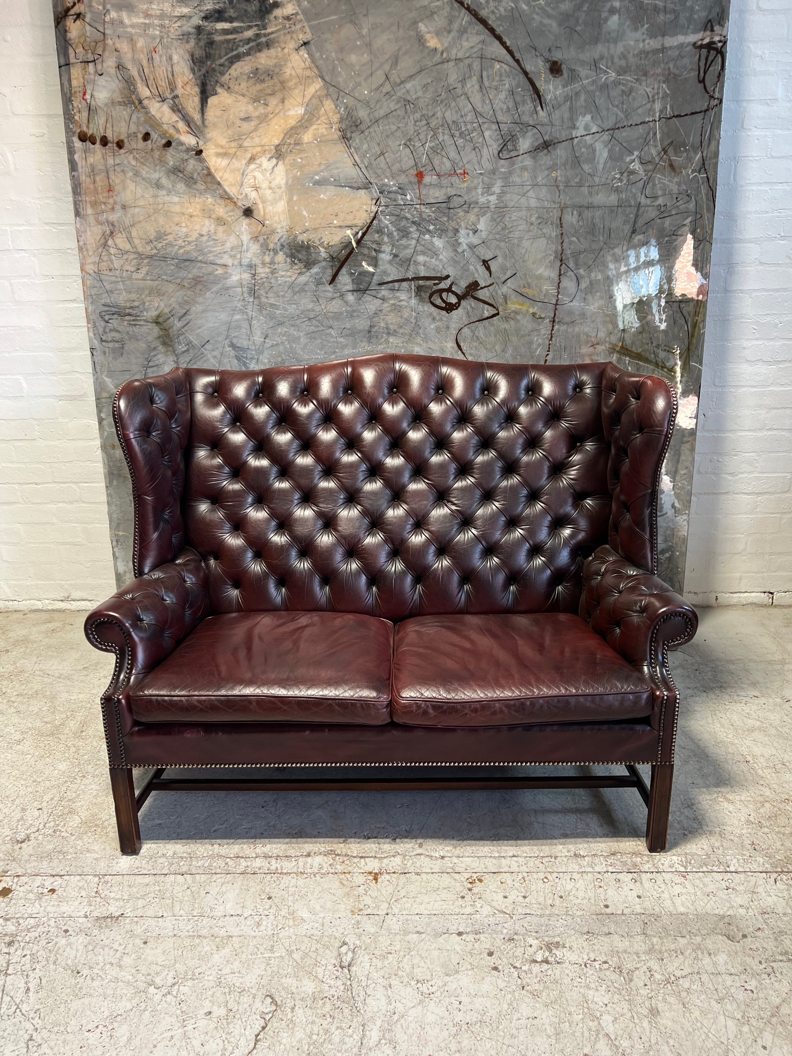 A Very Handsome MidC 2 Seat Wingback Chesterfield Sofa in Hand Dyed Wine Leathers