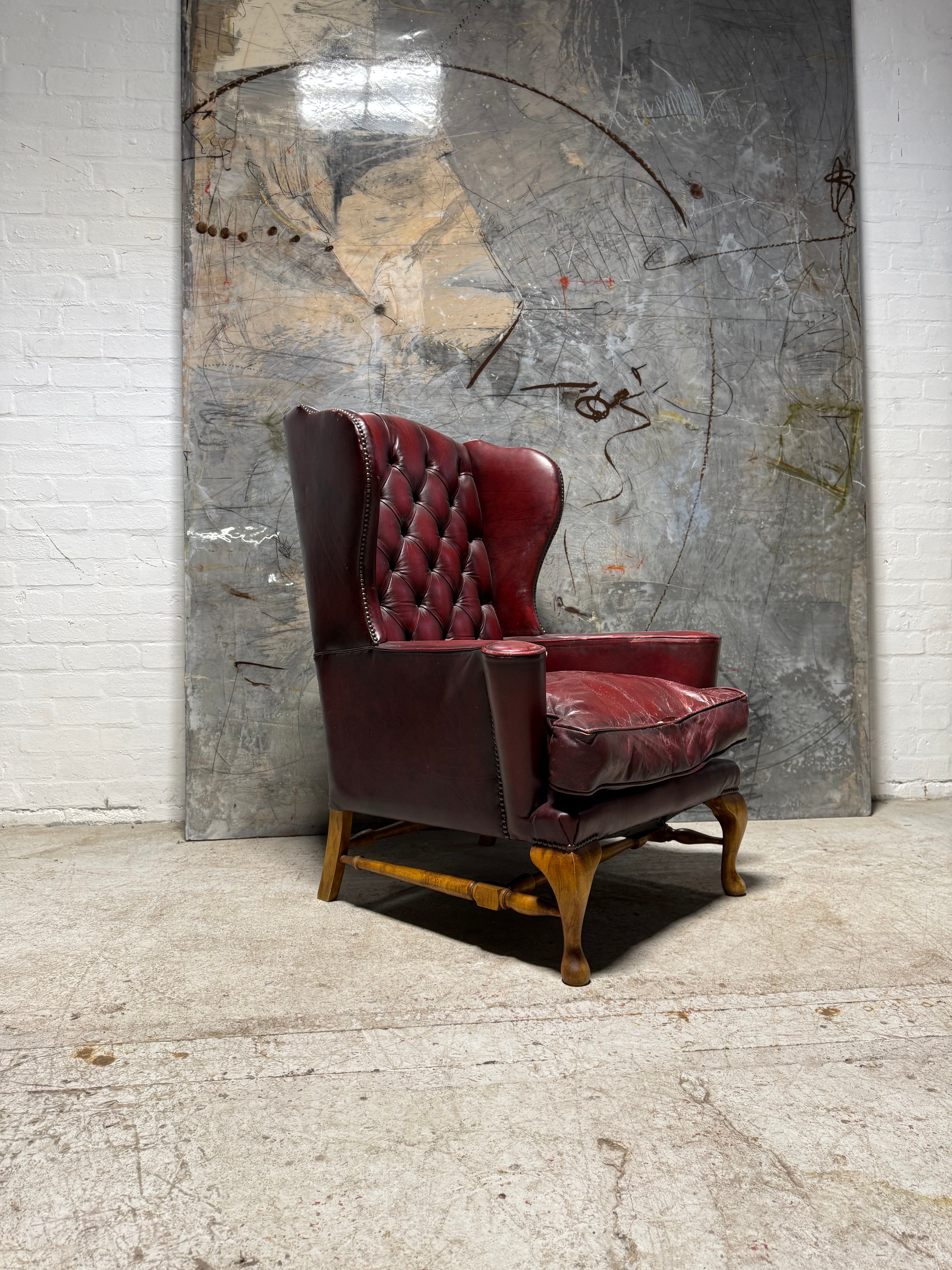 Beautiful Gentleman’s Leather Wing Back Armchair With Turned “H” Frame