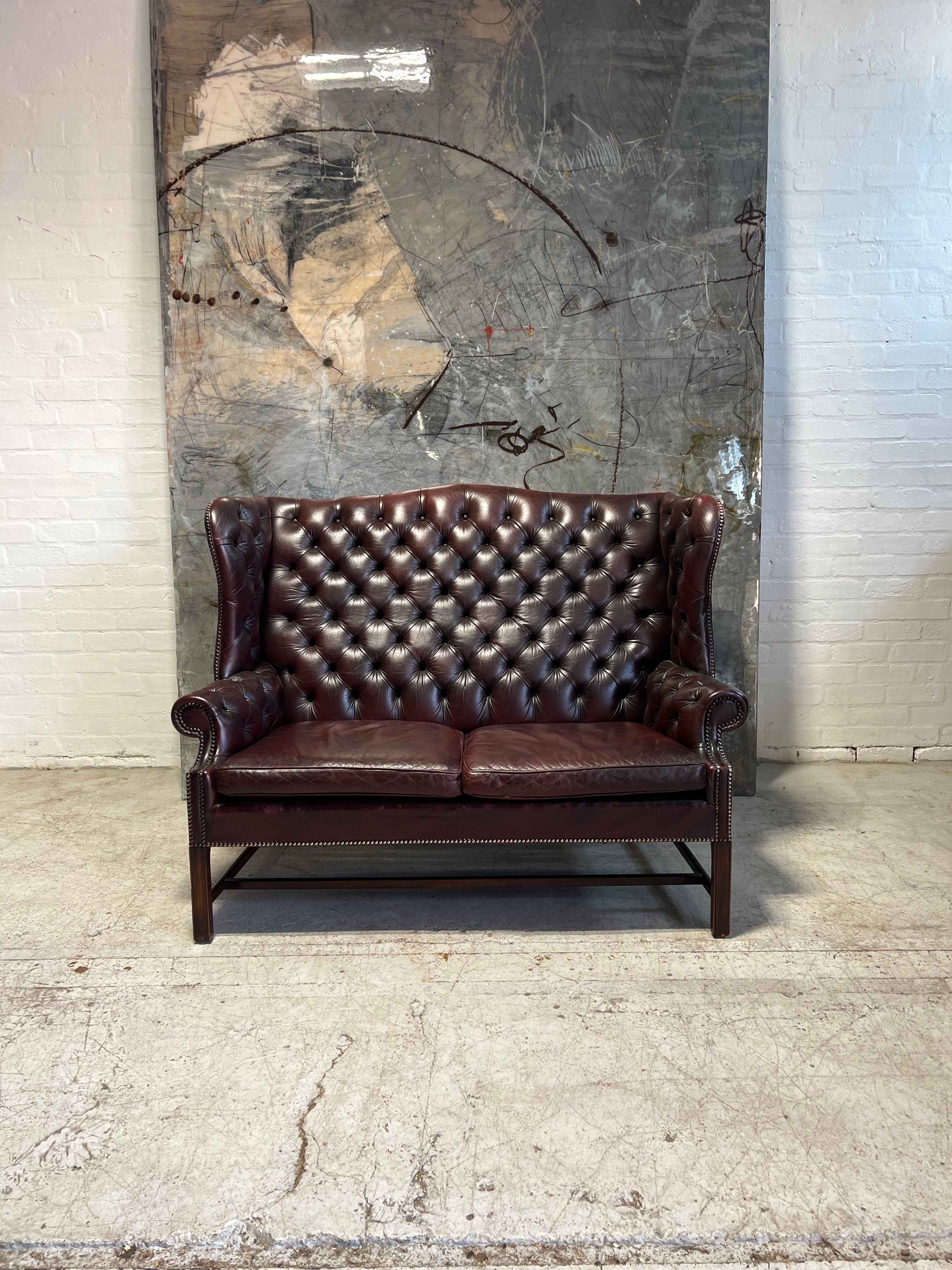 A Very Handsome MidC 2 Seat Wingback Chesterfield Sofa in Hand Dyed Wine Leathers