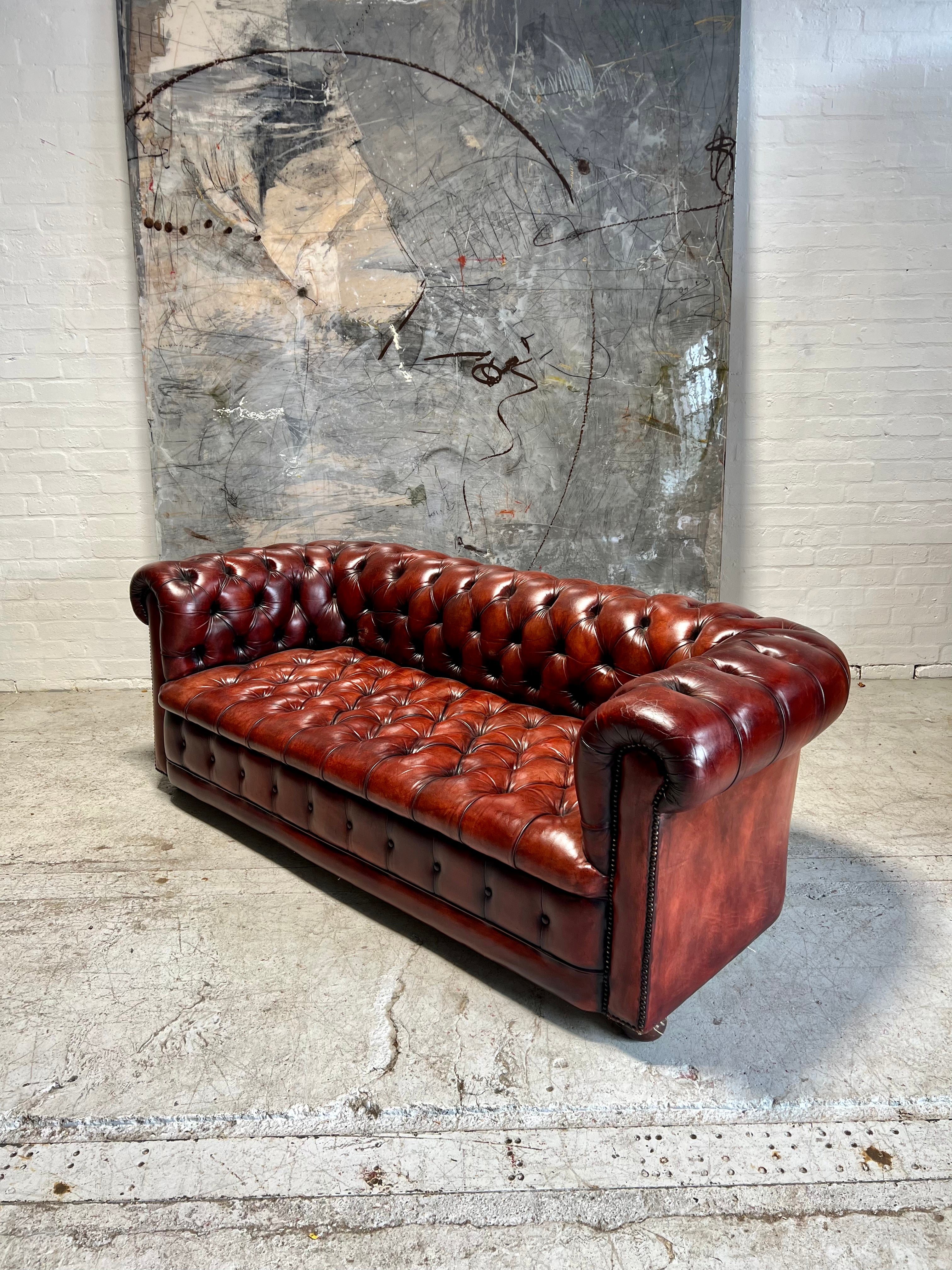 A Beautiful MidC Vintage Leather Chesterfield Sofa in Hand Dyed Cognac