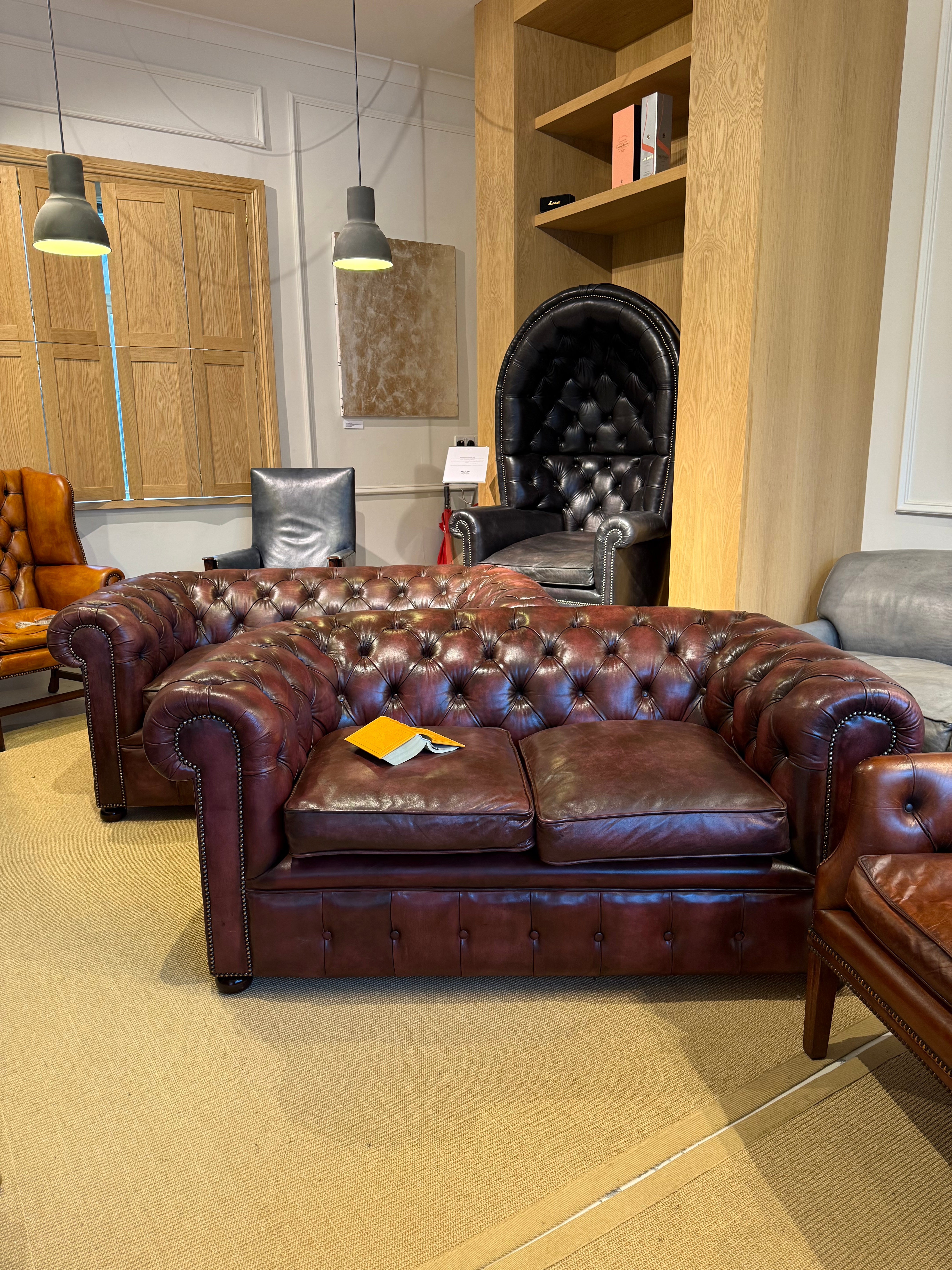 Fully Restored Matching Pair of Mid Century Leather Chesterfield Sofas