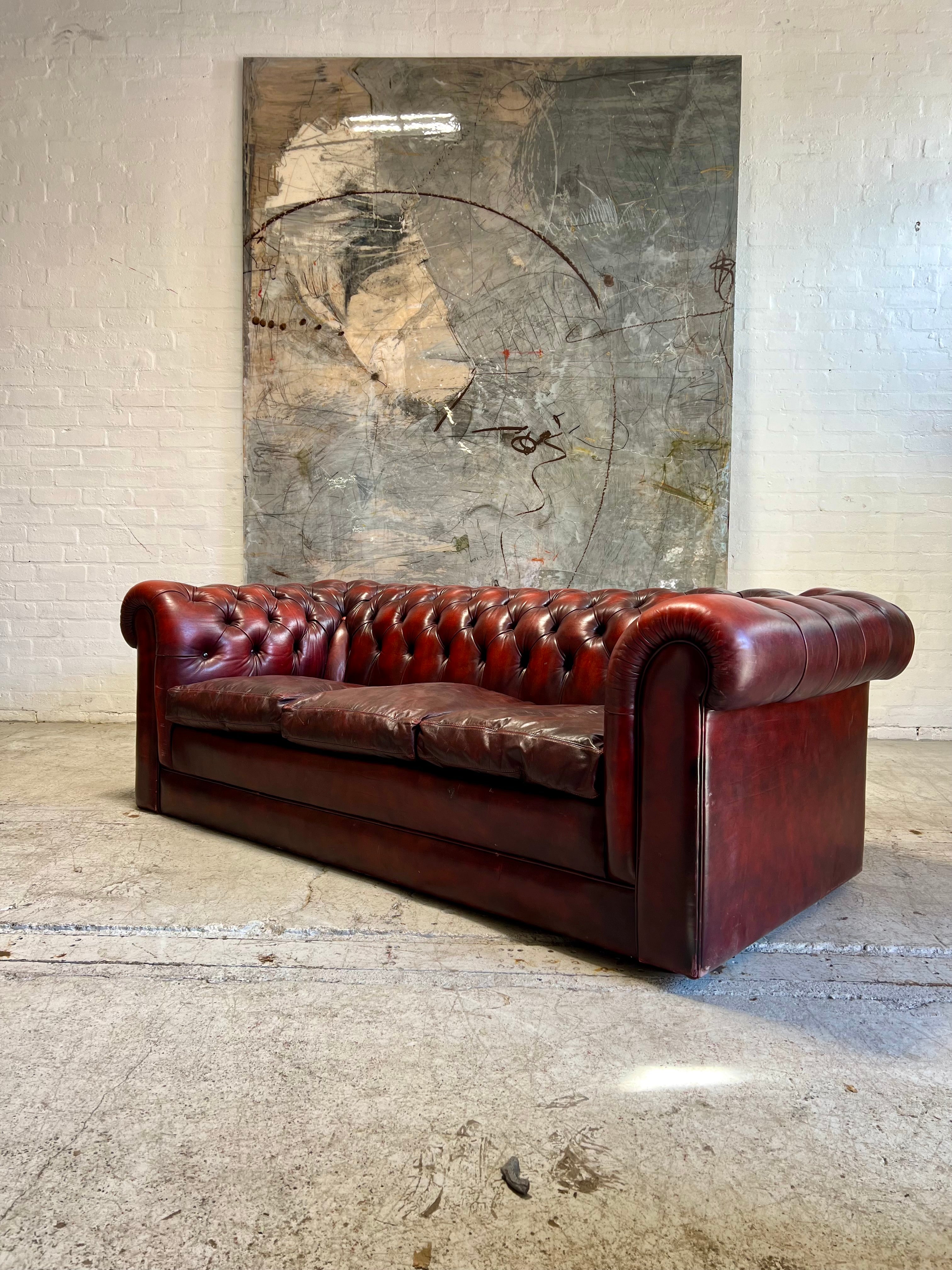 An Excellent Twice Loved Leather Chesterfield 3 Piece Suite with Coil Sprung Seats