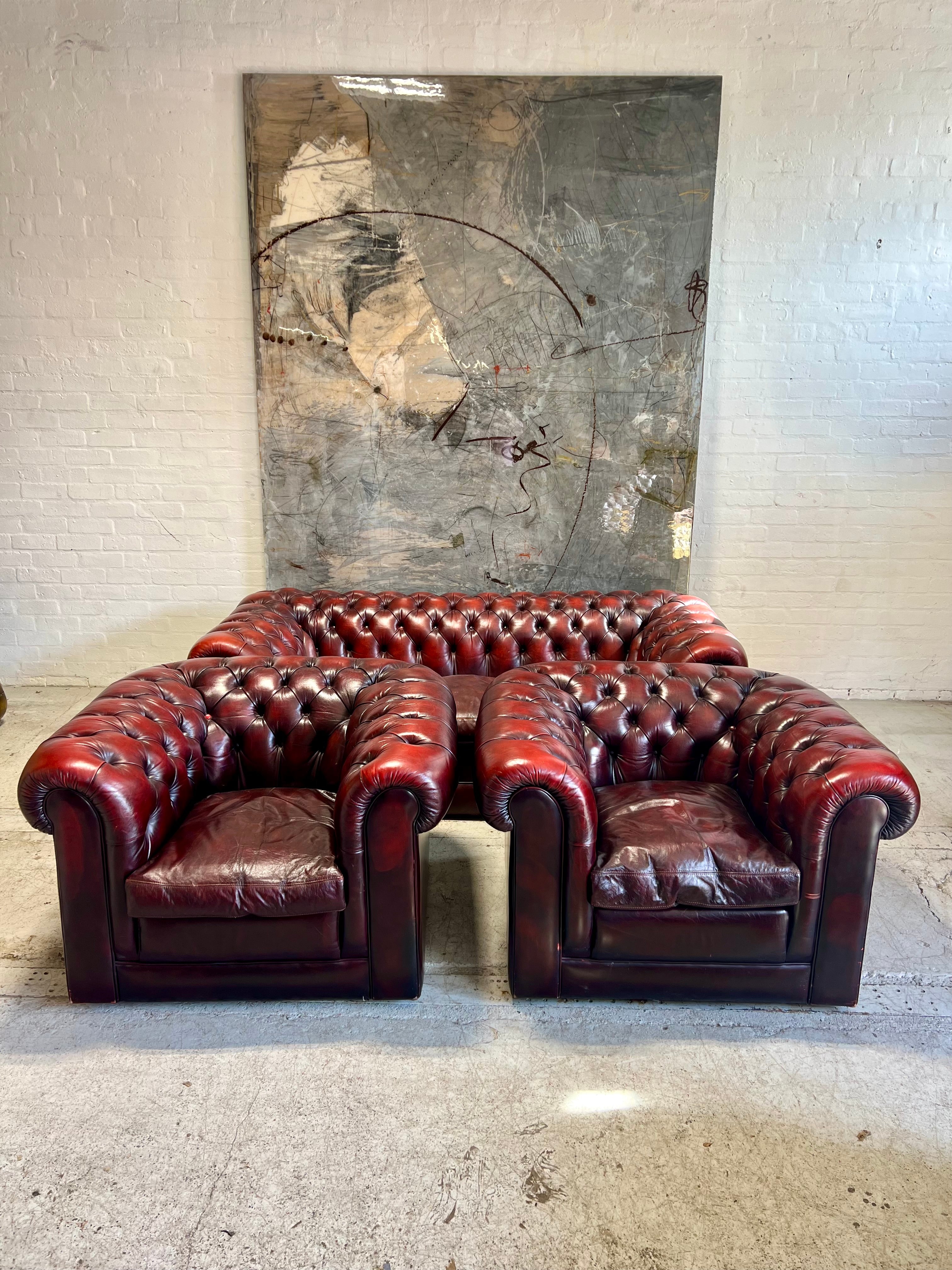 An Excellent Twice Loved Leather Chesterfield 3 Piece Suite with Coil Sprung Seats