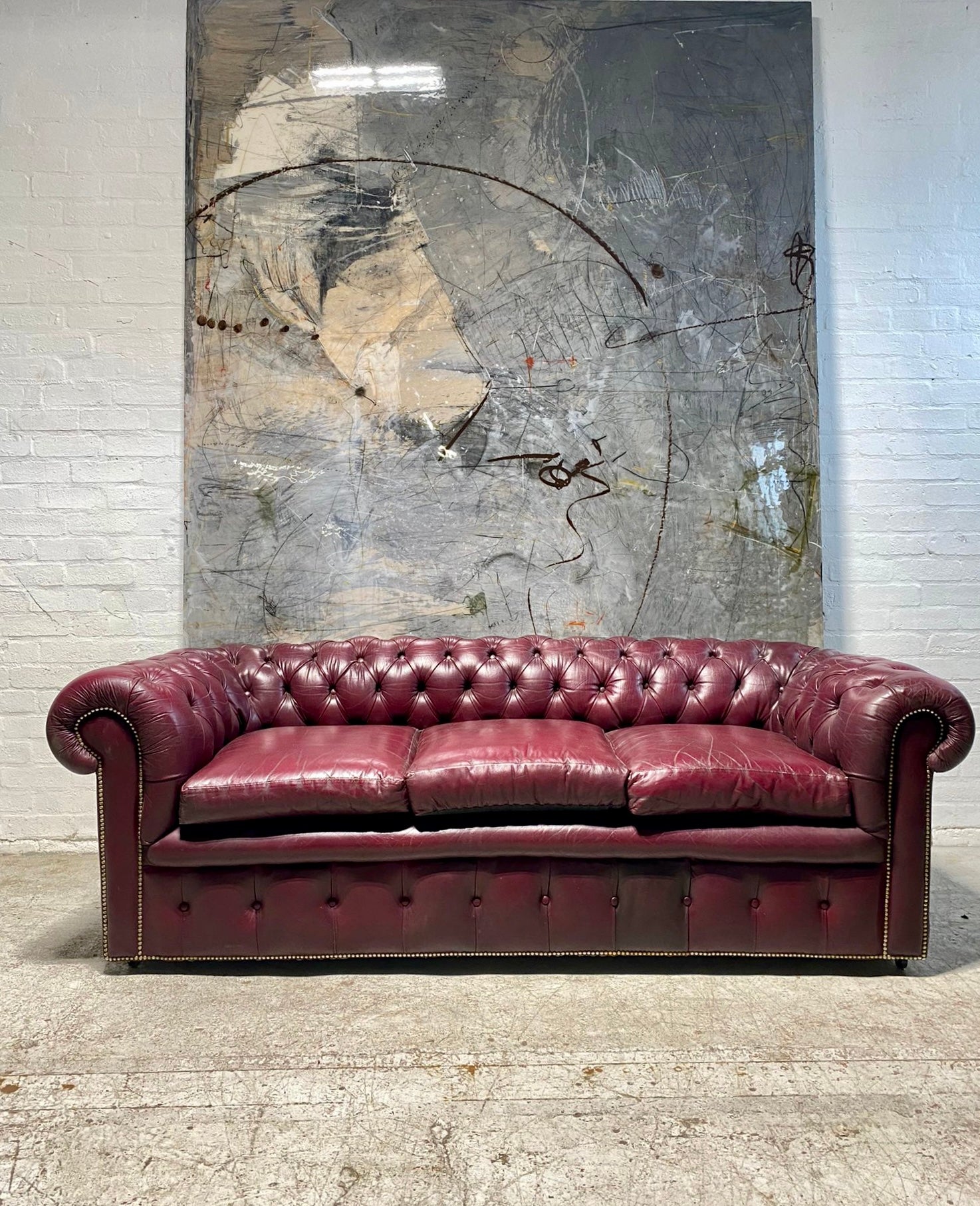 A Very Good Vintage Leather Chesterfield Sofa & Club Armchair in Rasberry Leathers