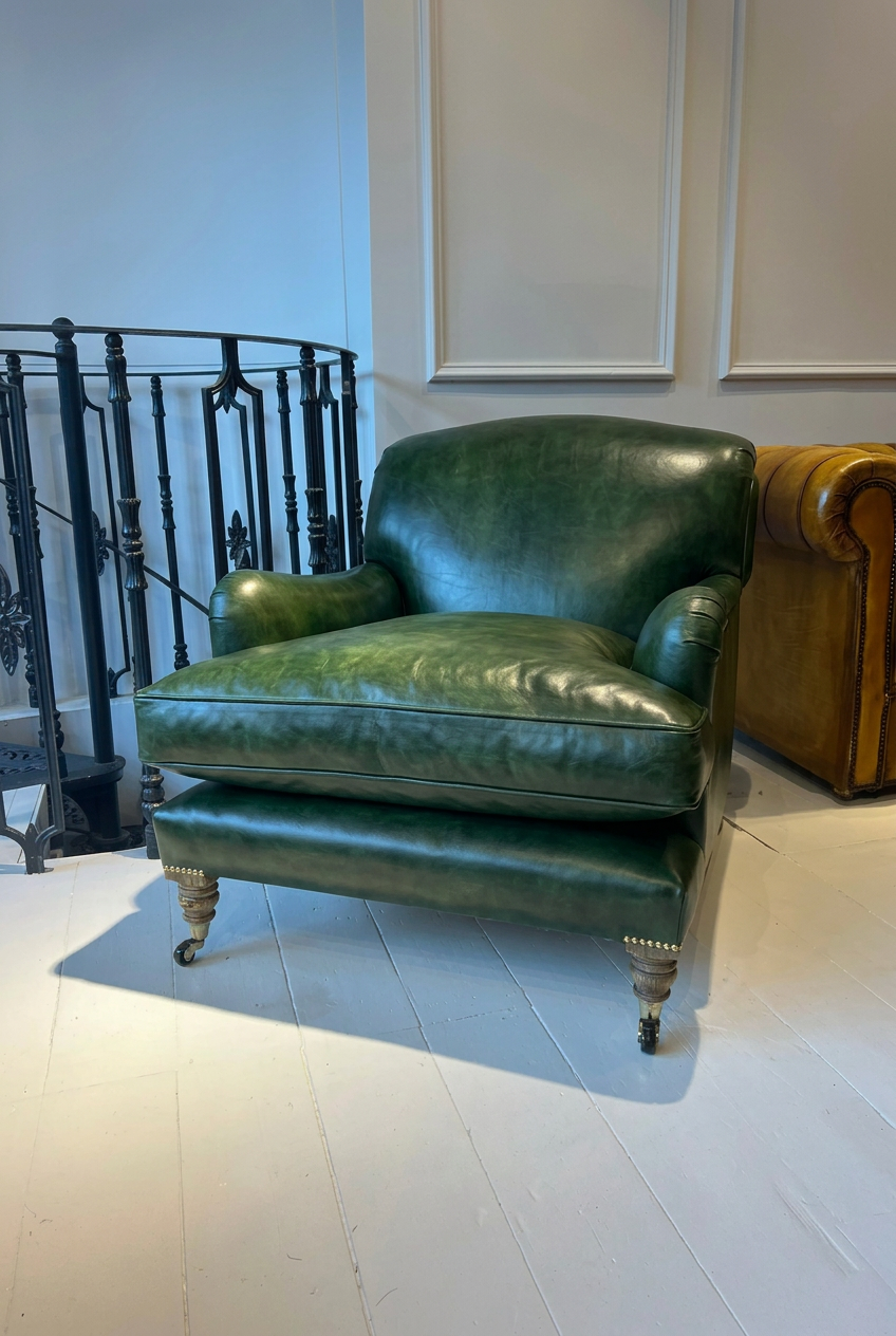 Our Matthew Armchair finished in Hand Dyed Terracotta Leather Robinson of England
