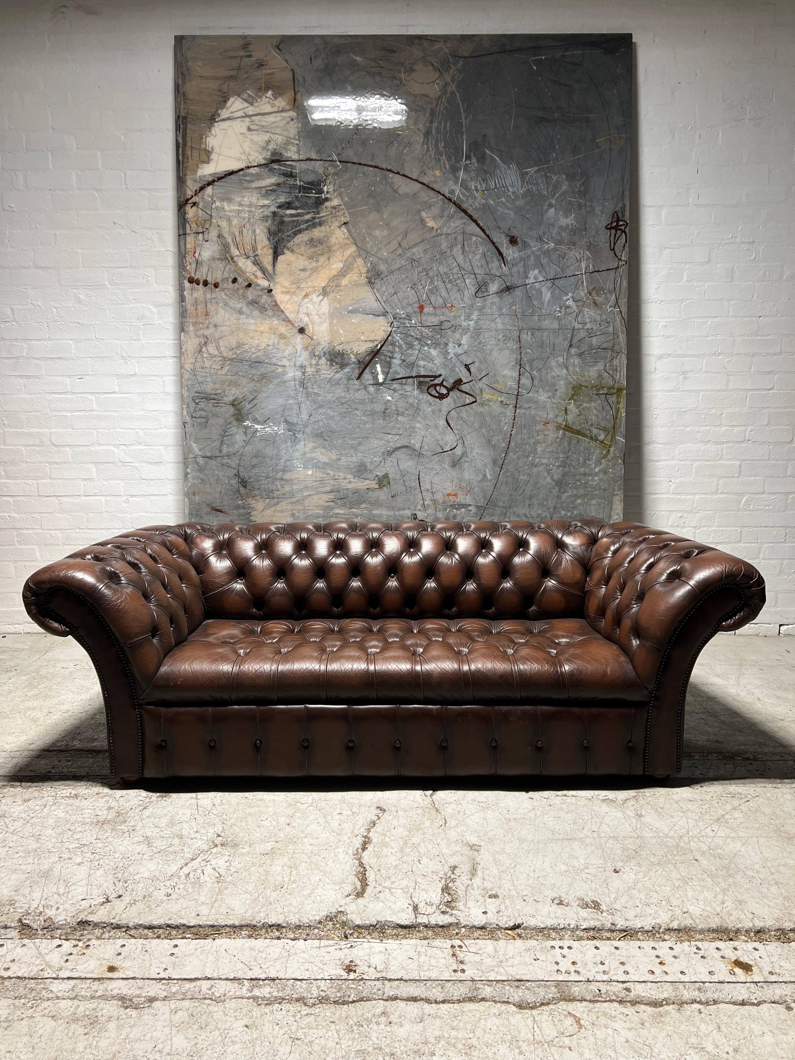 A Cool Splayed Arm 4 Seater Chesterfield Sofa