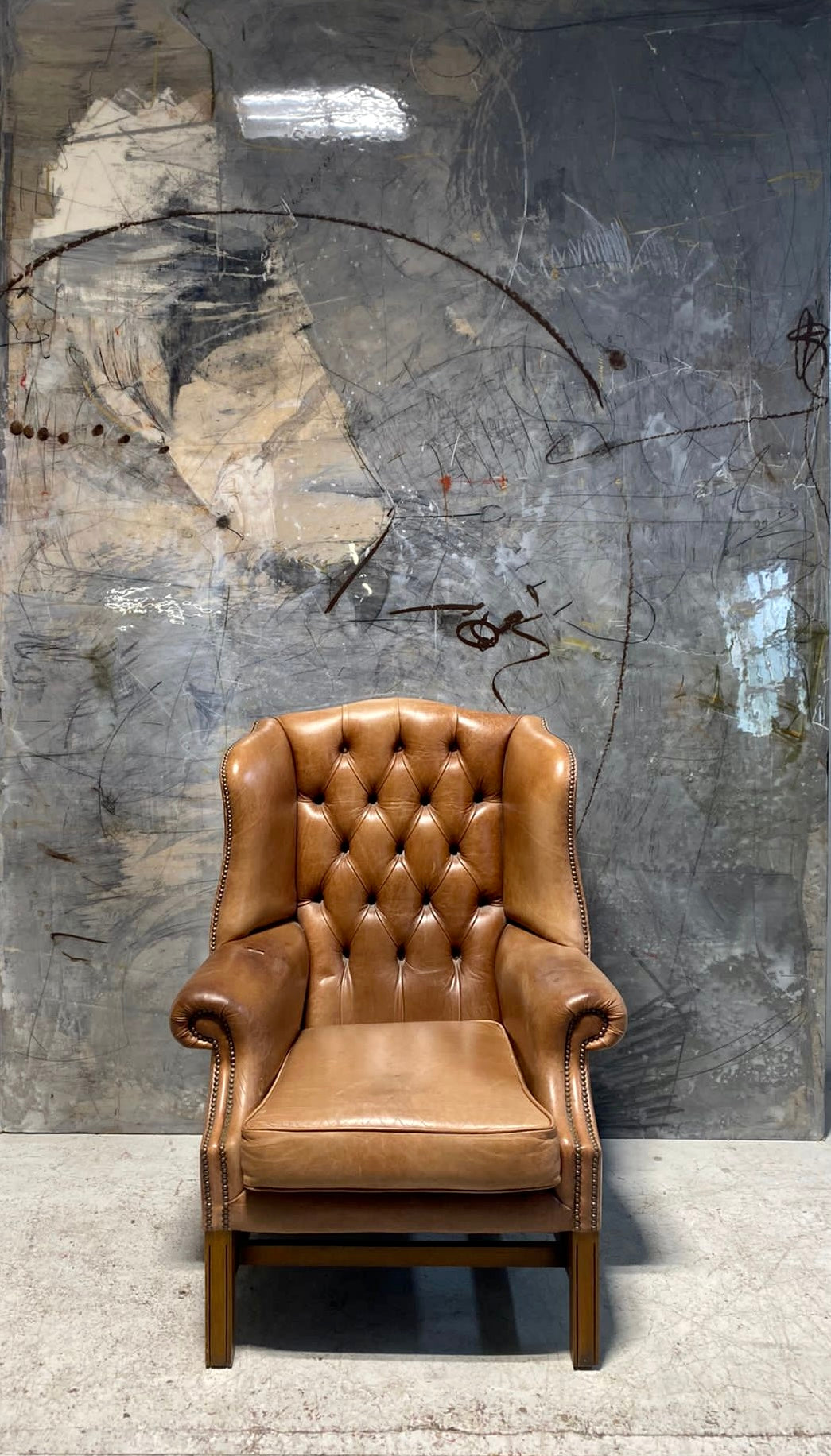 A Really Nice Gentleman’s Chesterfield Wing Back Chair in Tan Leather