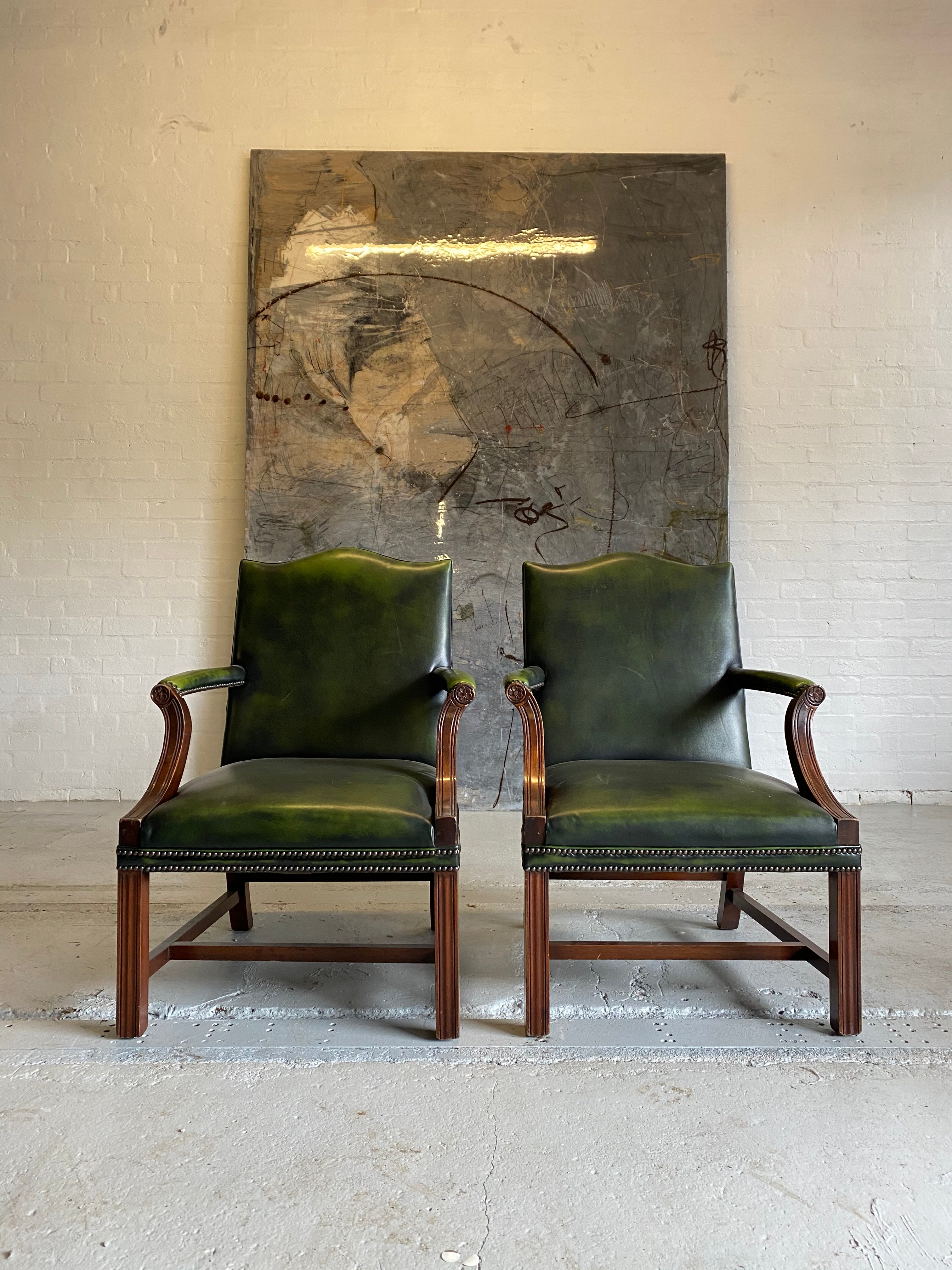 A Beautiful Pair of Library Chairs in Deep Green Leathers